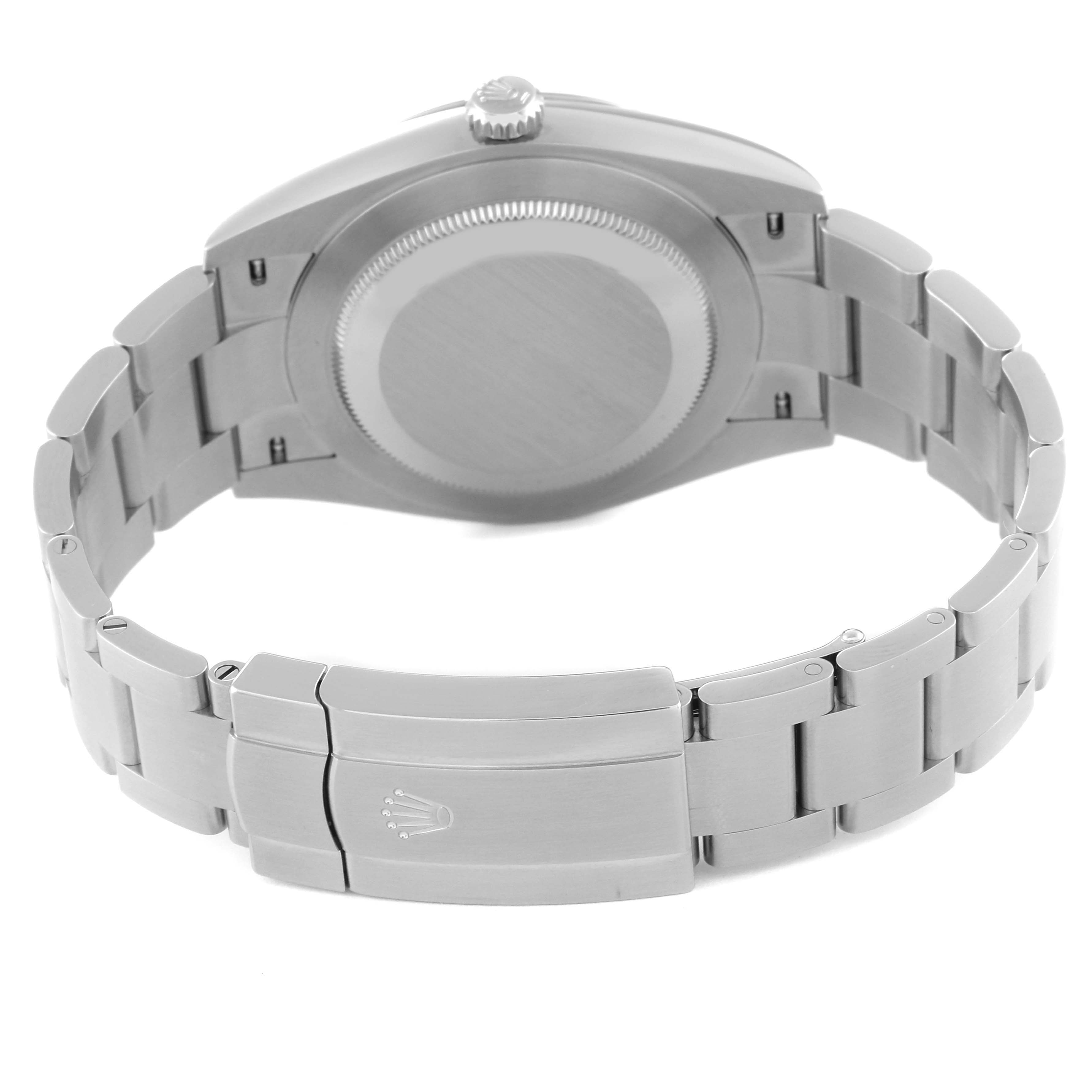 The image shows the back view of the Rolex Oyster Perpetual 124300 Men's Stainless Steel Blue Dial 124300 Men's Stainless Steel Blue Dial watch, highlighting its case back and bracelet clasp.