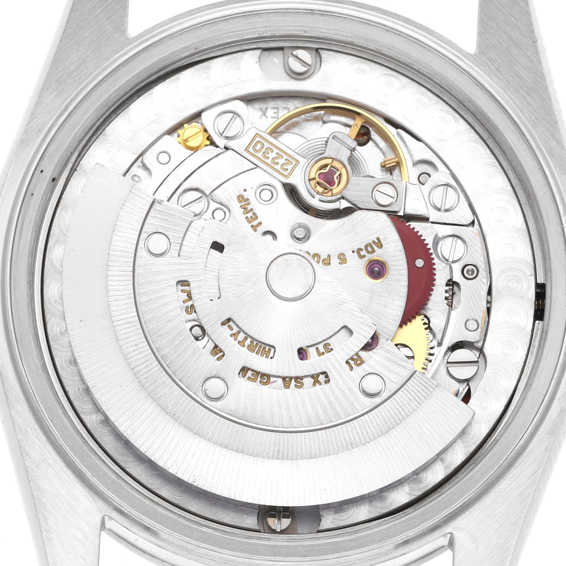 The image shows the back view of a Rolex Oyster Perpetual watch, highlighting the intricate movement and inner mechanism.
