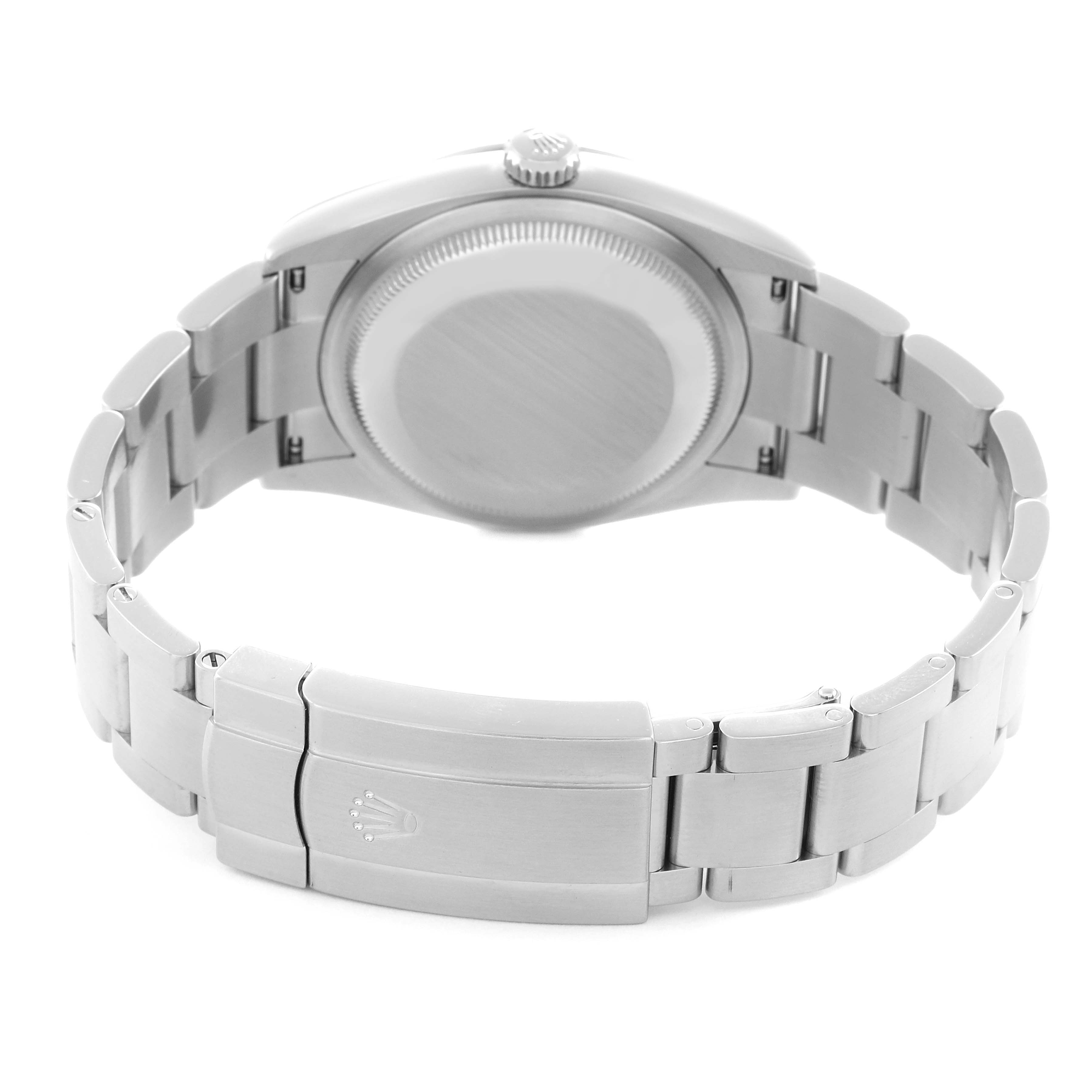 The image shows the back view of a Rolex Oyster Perpetual watch, model 126000, highlighting the case back and bracelet clasp.