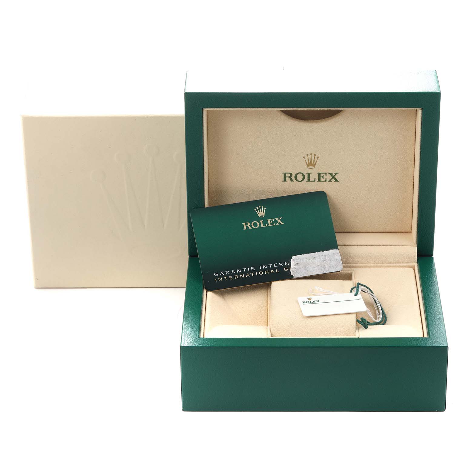The image shows the packaging and accessories of a Rolex Oyster Perpetual model 126000 men's watch, including the box, warranty card, and tags.
