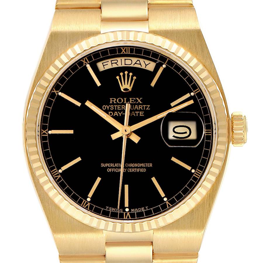 The Rolex Oysterquartz Day-Date model 19018N is shown from a frontal angle, highlighting the watch face, gold case, bezel, and crown.