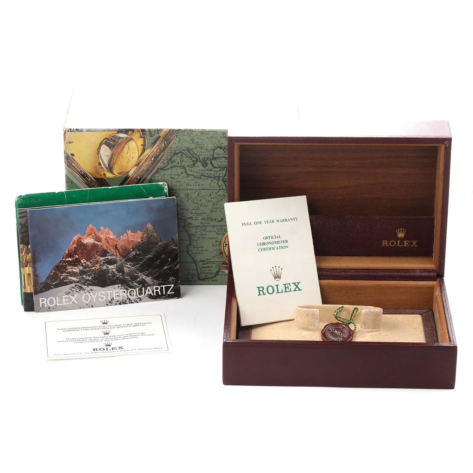 The image shows a Rolex Oysterquartz model 19018N men's watch packaging, including a box, manuals, a warranty certificate, and a tag.