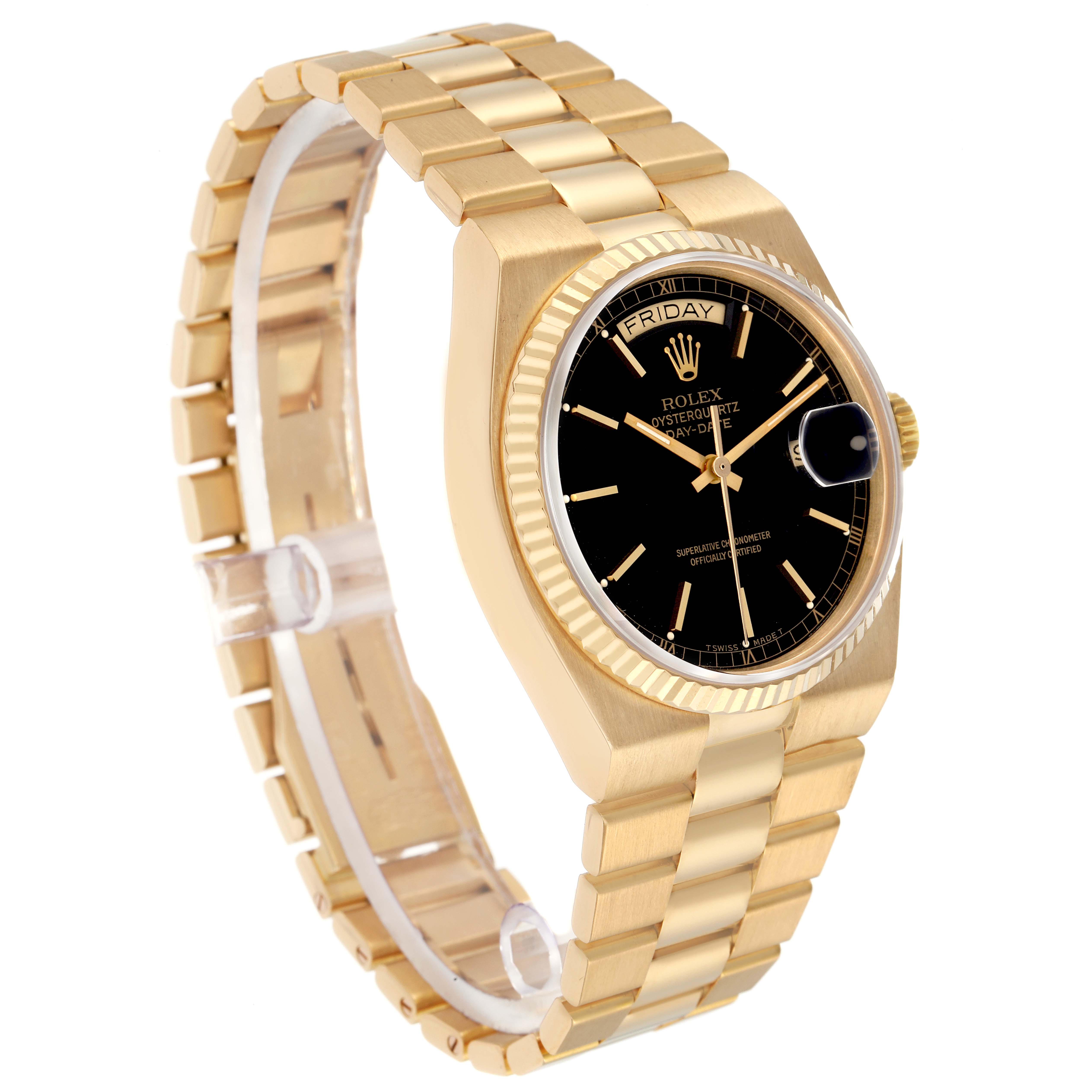 The image shows a Rolex Oysterquartz model 19018N watch at a side angle, highlighting the bracelet, black dial, day-date display, and fluted bezel.