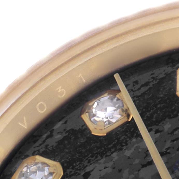 This close-up of the Rolex Datejust model 179178 shows a portion of the dial with diamond markers and part of the hands.