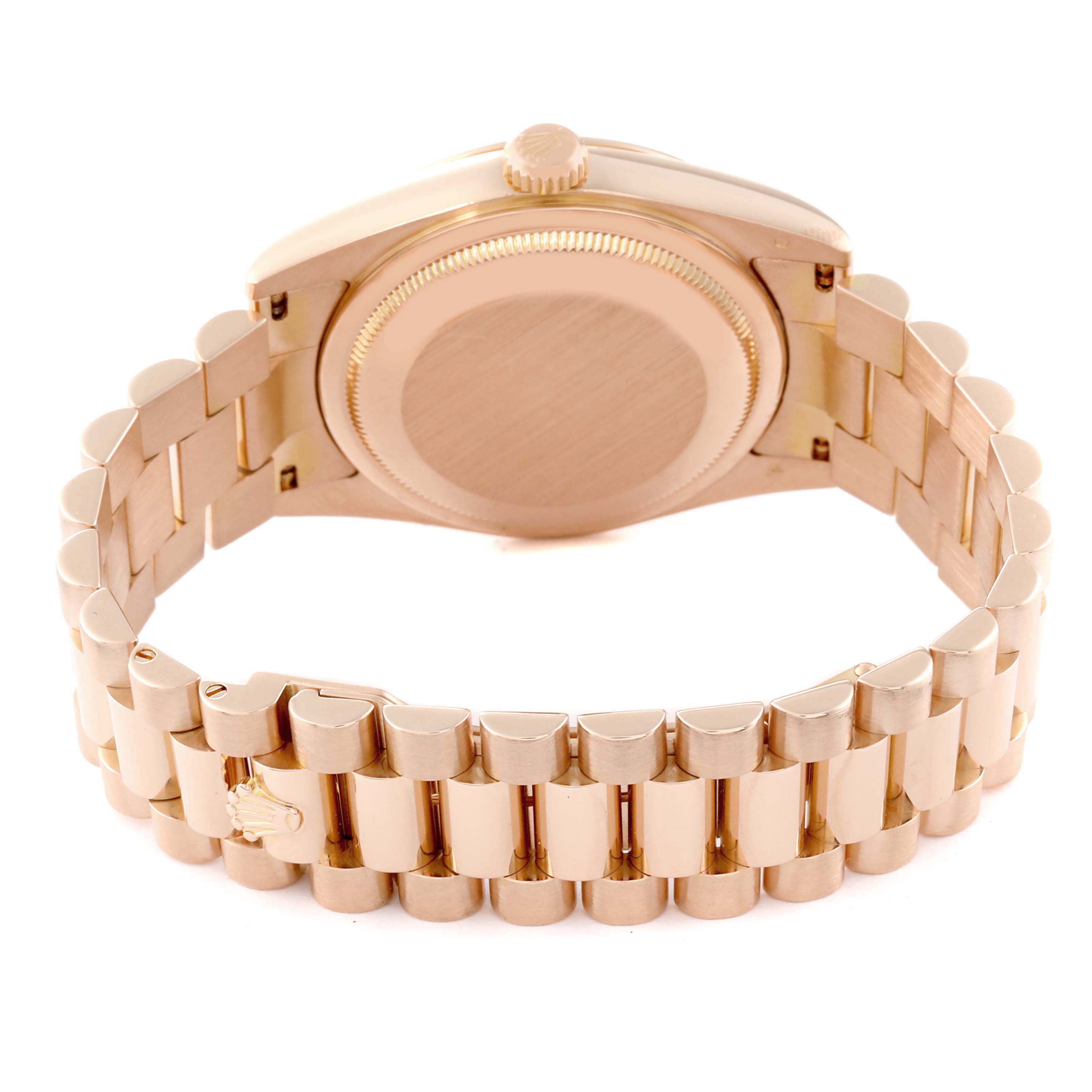 The image shows the back and bracelet of a Rolex President 118205 Men's Rose Gold Pink Dial 118205 Men's Rose Gold Pink Dial model watch, with a focus on the clasp and rear case.