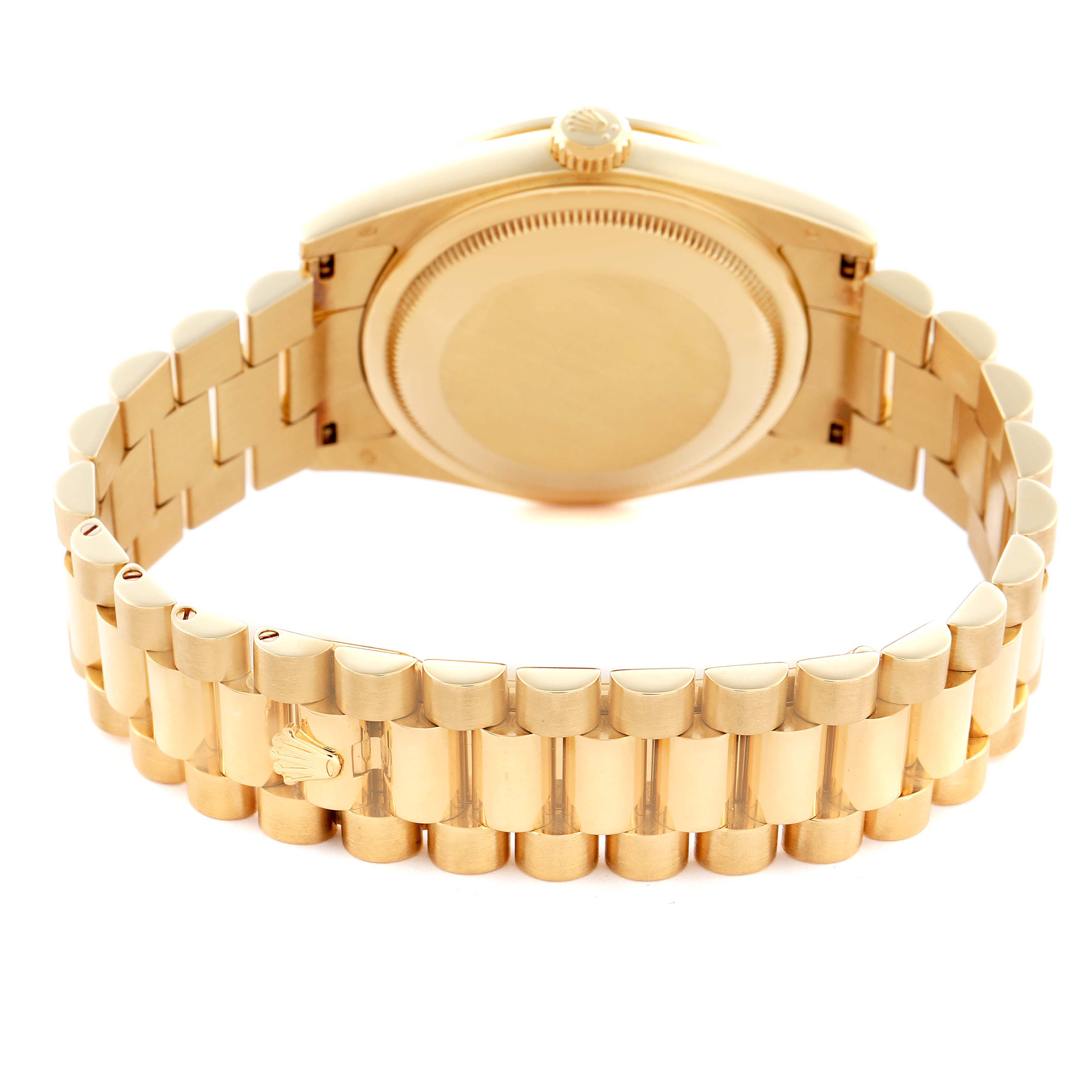 The image shows the back view of a Rolex President, model number 118388, highlighting the case back, crown, and gold bracelet with a partially visible clasp.