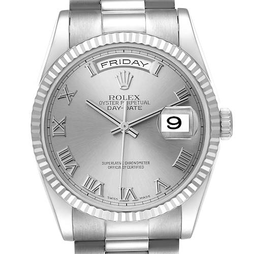 The image shows a frontal view of a Rolex President model watch, displaying the bezel, dial, hands, day, and date indicators.