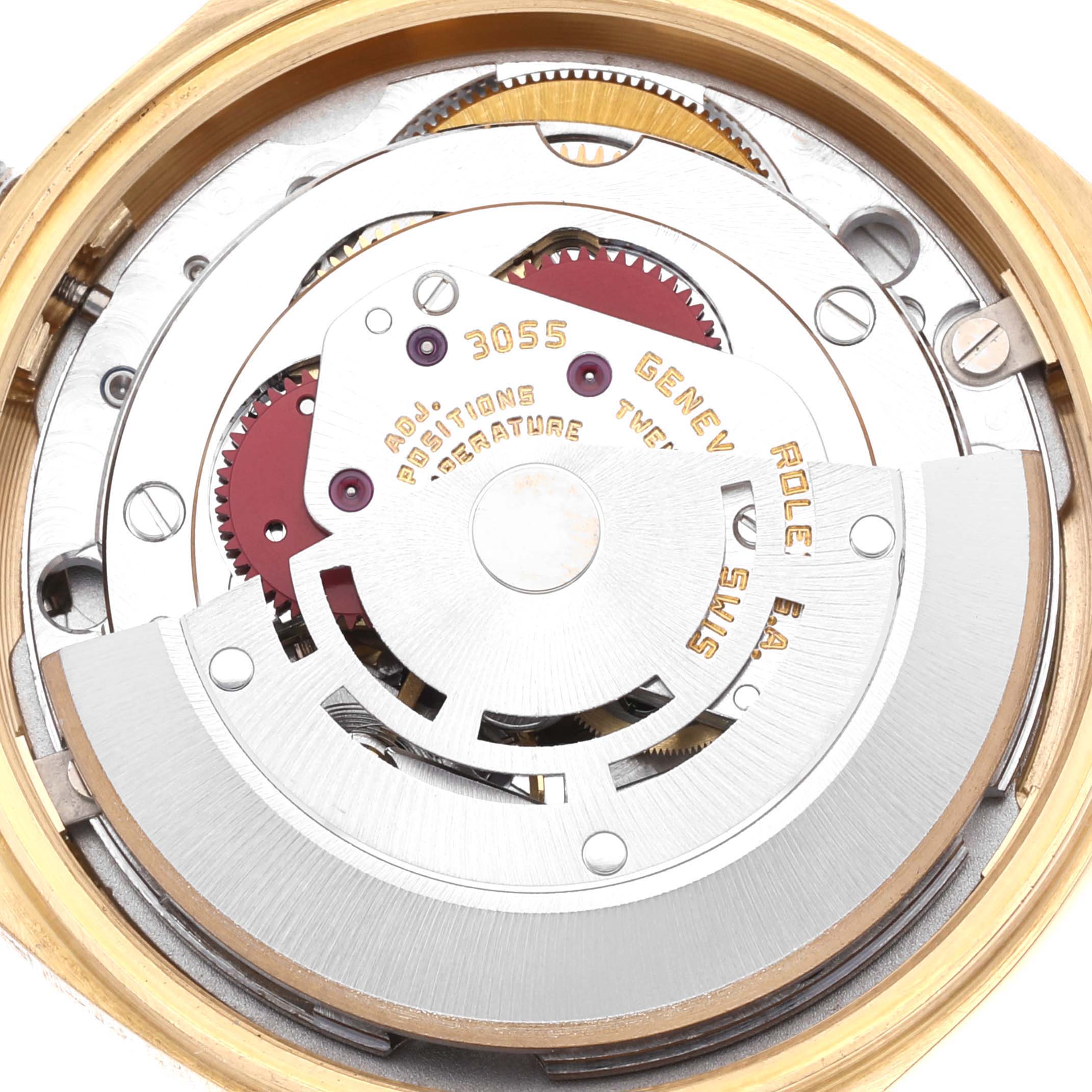 This image shows the internal mechanism and movement of a Rolex President 18038 Men
s Yellow Gold Champagne Dial 18038 Men
s Yellow Gold Champagne Dial model watch, viewed from the back with its case opened.