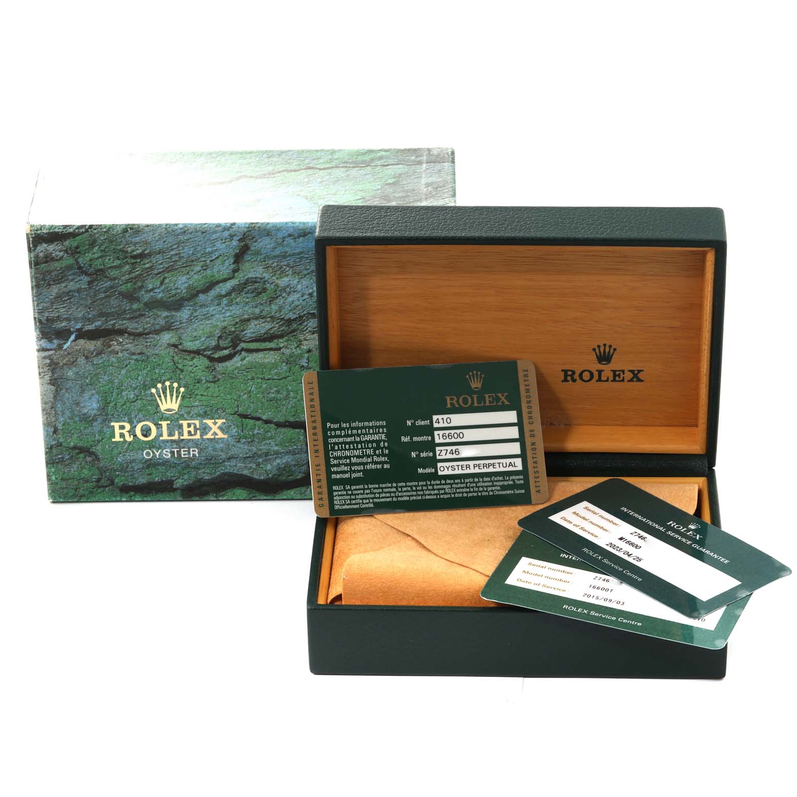 The angle shows the open box of a Rolex Sea-Dweller 16600 Men's Stainless Steel Black Dial 16600 Men's Stainless Steel Black Dial with guarantee cards and packaging.