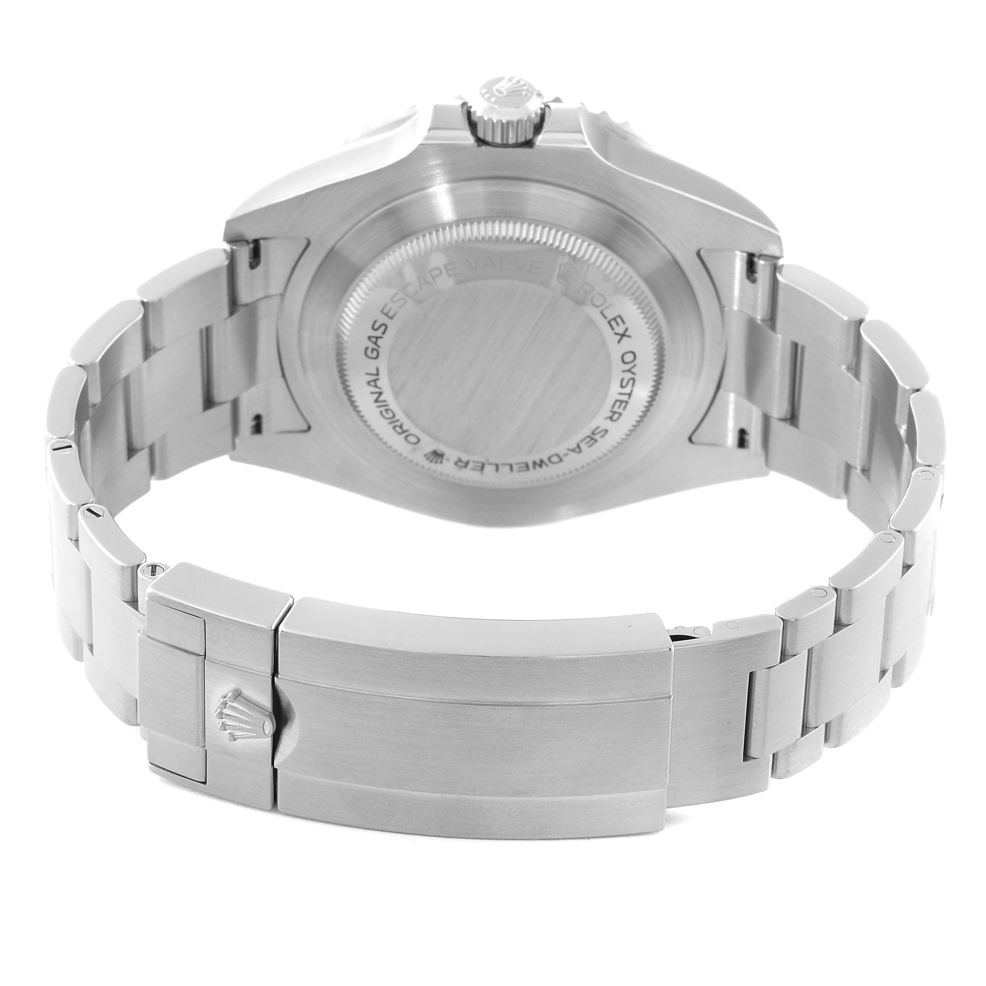 The image shows the rear view of the Rolex Sea-Dweller 126600 Men
s Stainless Steel Black Dial 126600 Men
s Stainless Steel Black Dial watch, highlighting its case back and bracelet clasp.