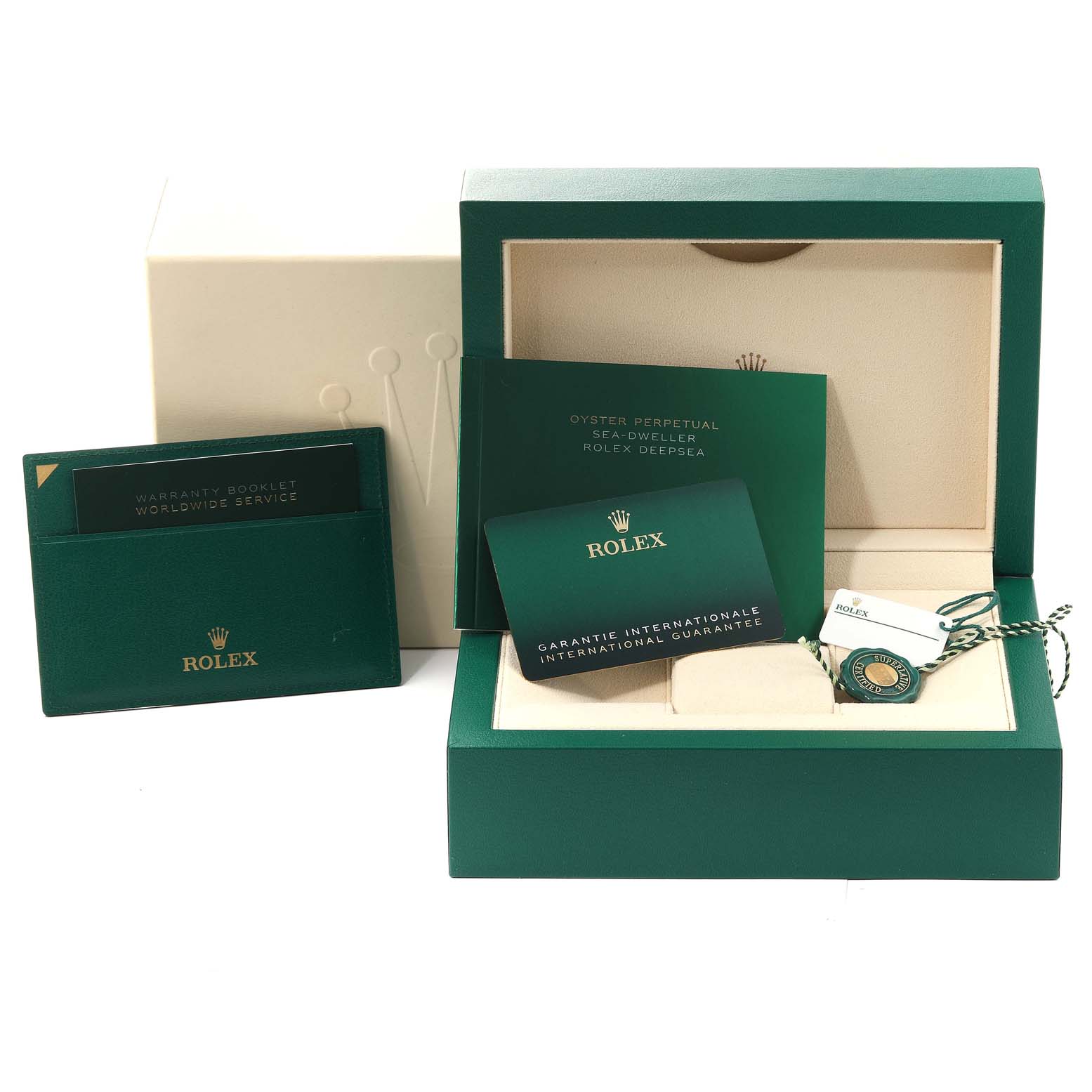 The image shows a Rolex Sea-Dweller 126600 Men
s Stainless Steel Black Dial 126600 Men
s Stainless Steel Black Dial watch box, warranty booklet, international guarantee card, and tags from a frontal angle.