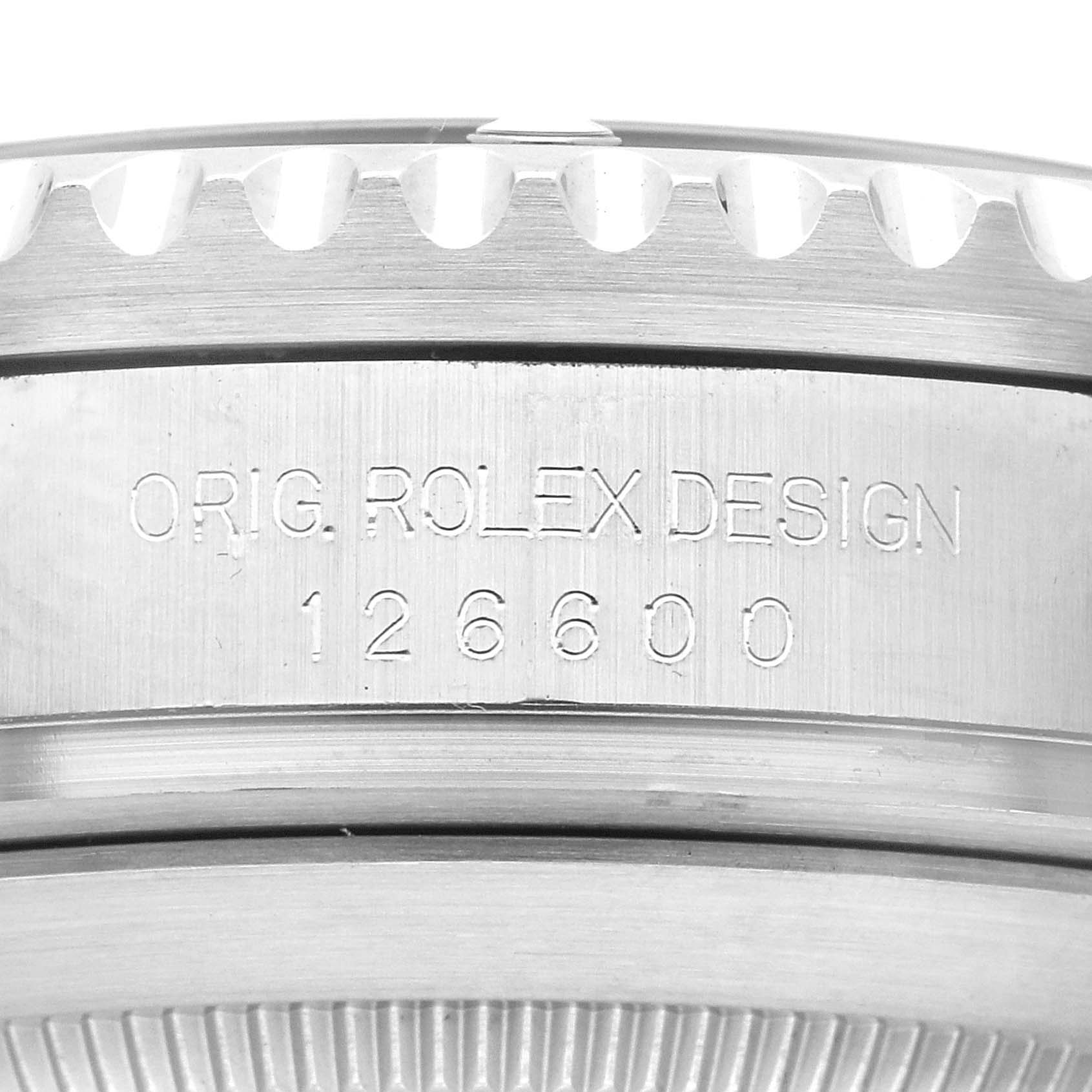 The image shows an engraving on the side profile of the bezel and case of a Rolex Sea-Dweller 126600 Men
s Stainless Steel Black Dial 126600 Men
s Stainless Steel Black Dial watch, model 126600.