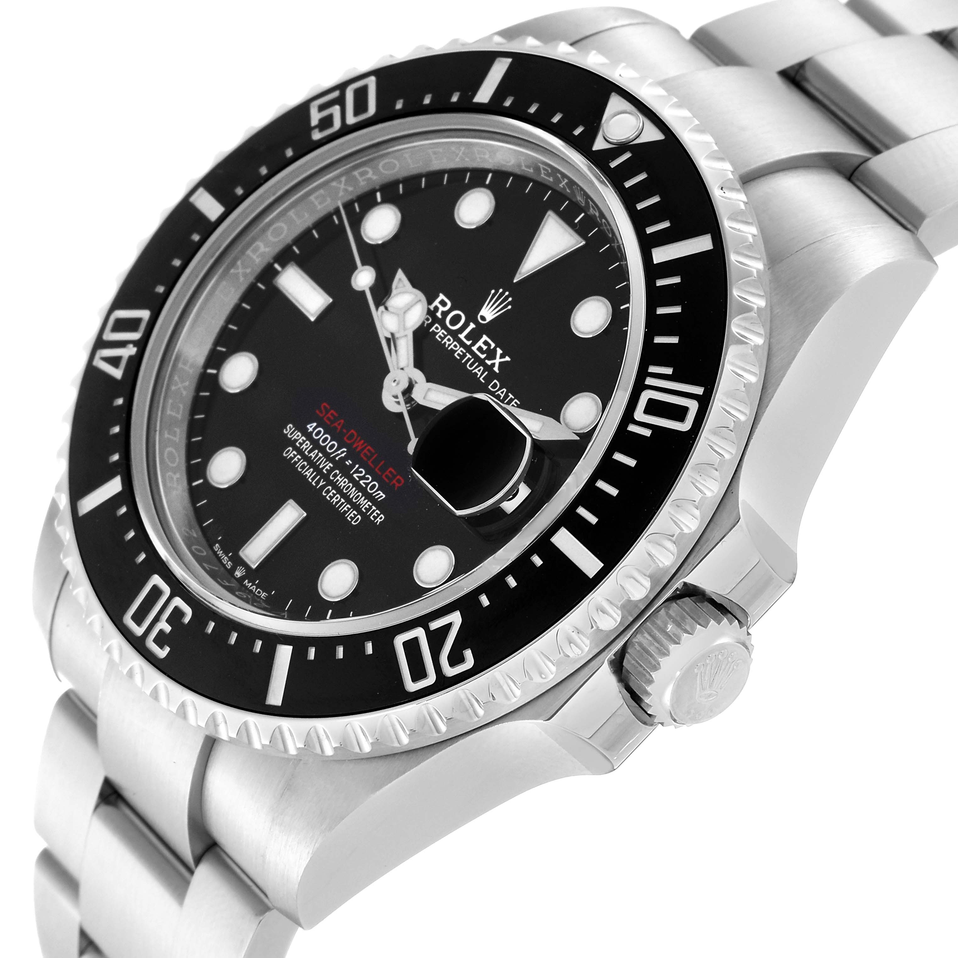 The image shows a side-angle view of a Rolex Sea-Dweller 126600 Men
s Stainless Steel Black Dial 126600 Men
s Stainless Steel Black Dial watch, highlighting the bezel, crown, and part of the bracelet.