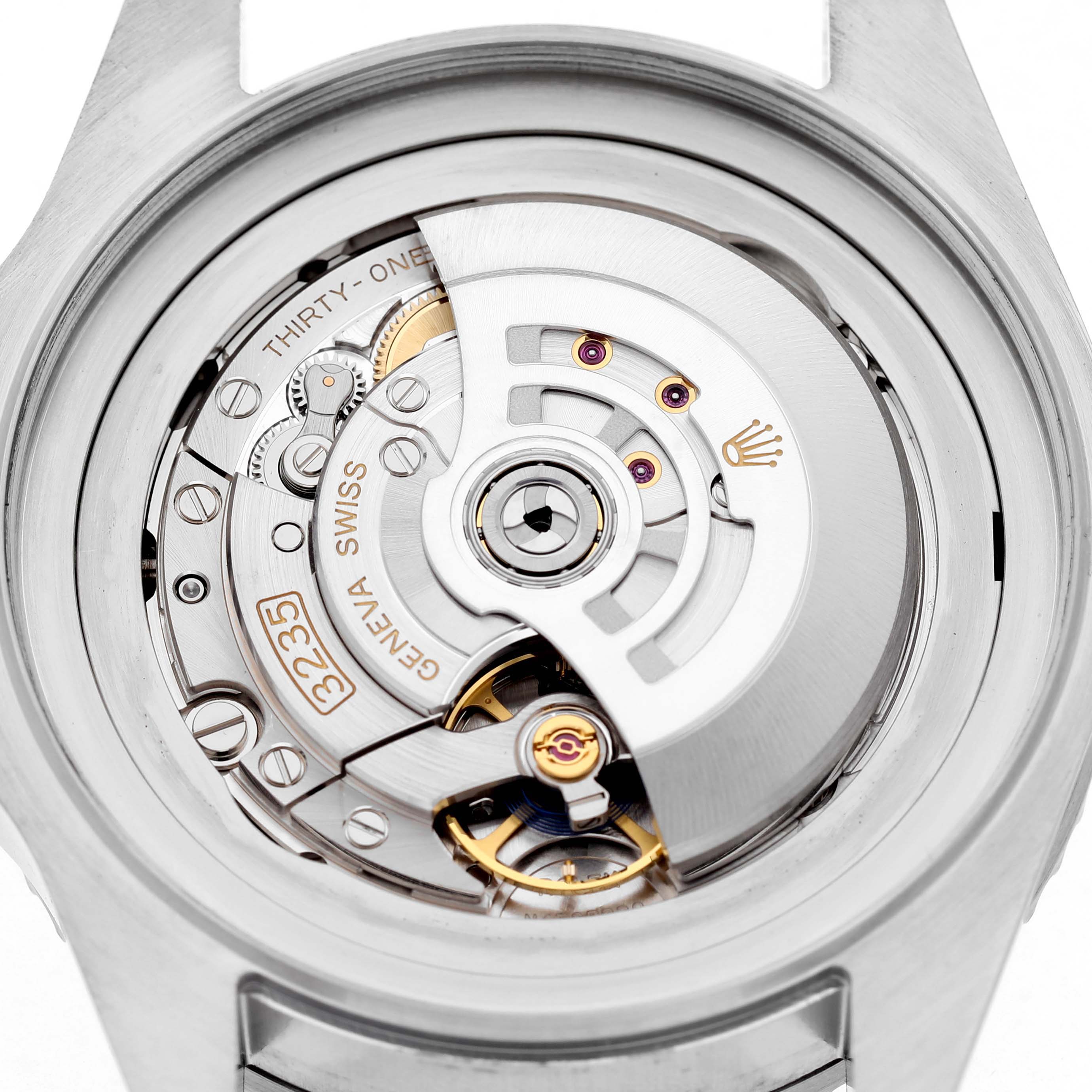 The image shows the rear view of a Rolex Sea-Dweller 126660 Men's Stainless Steel Black Dial, highlighting its intricate movement components.