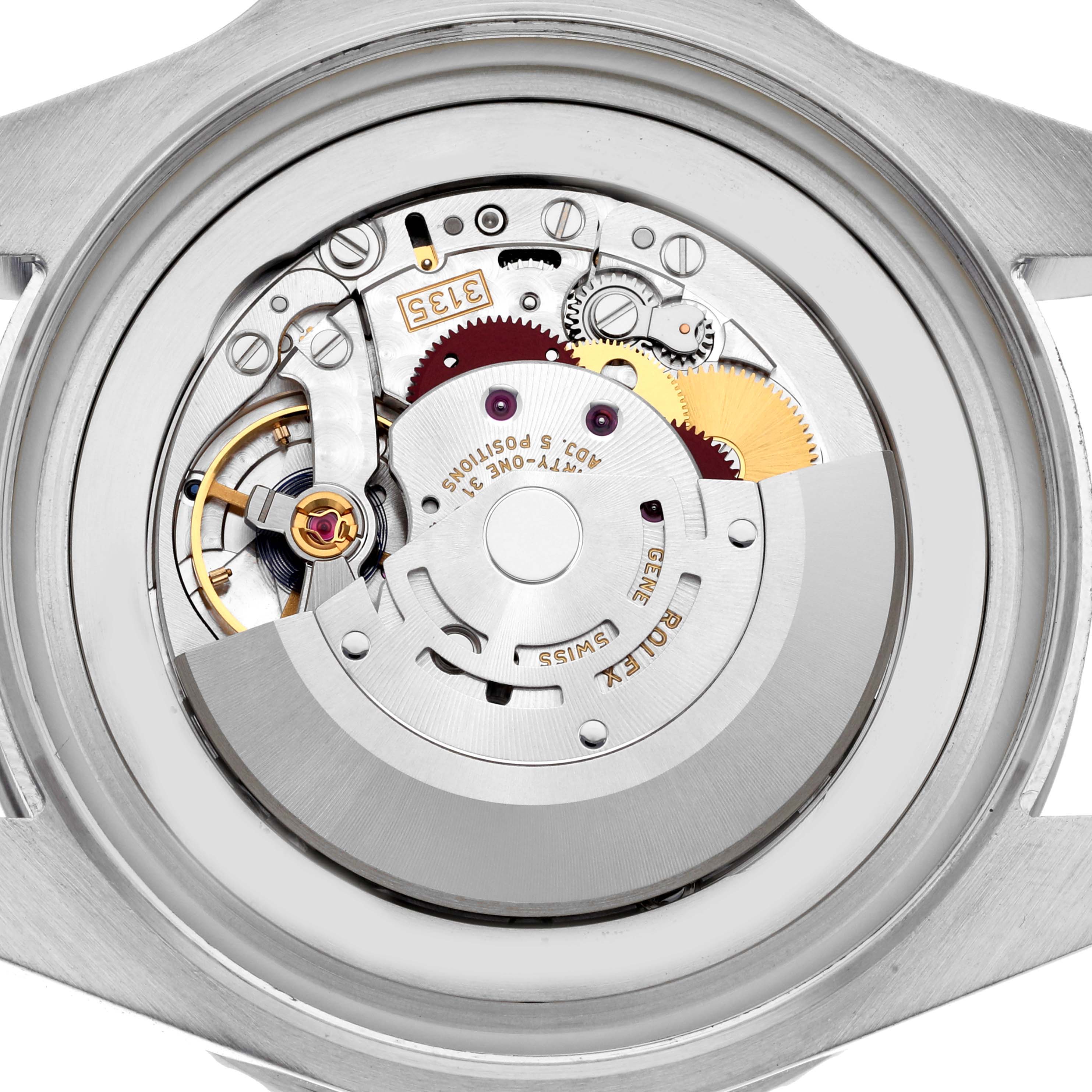 The image shows a close-up of the movement and inner mechanism of a Rolex Sea-Dweller model 116660, focusing on gears and components from the back.
