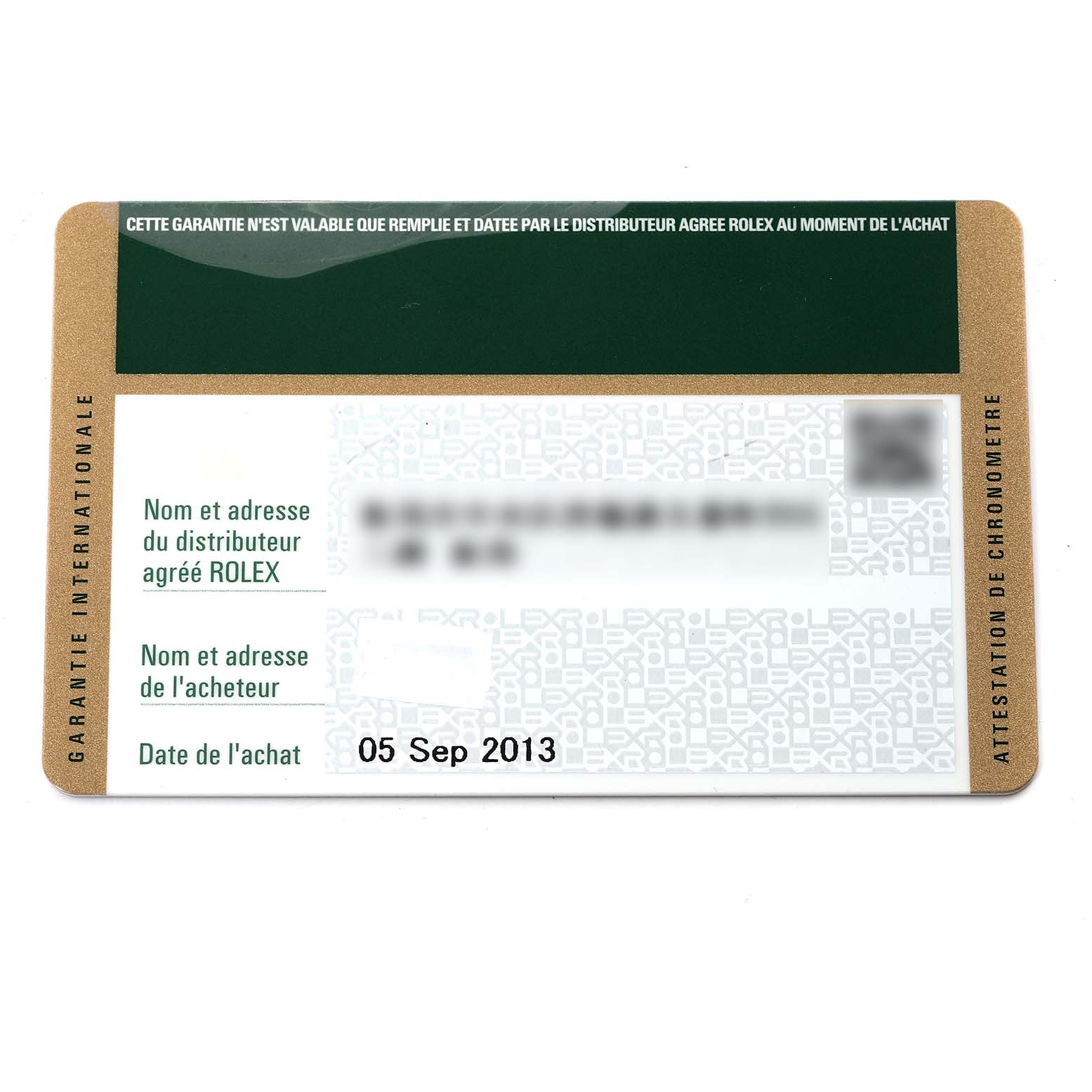 This is the warranty card for a Rolex Submariner 114060 Men
s Stainless Steel Black Dial 114060 Men
s Stainless Steel Black Dial, showing purchase date and distributor information.