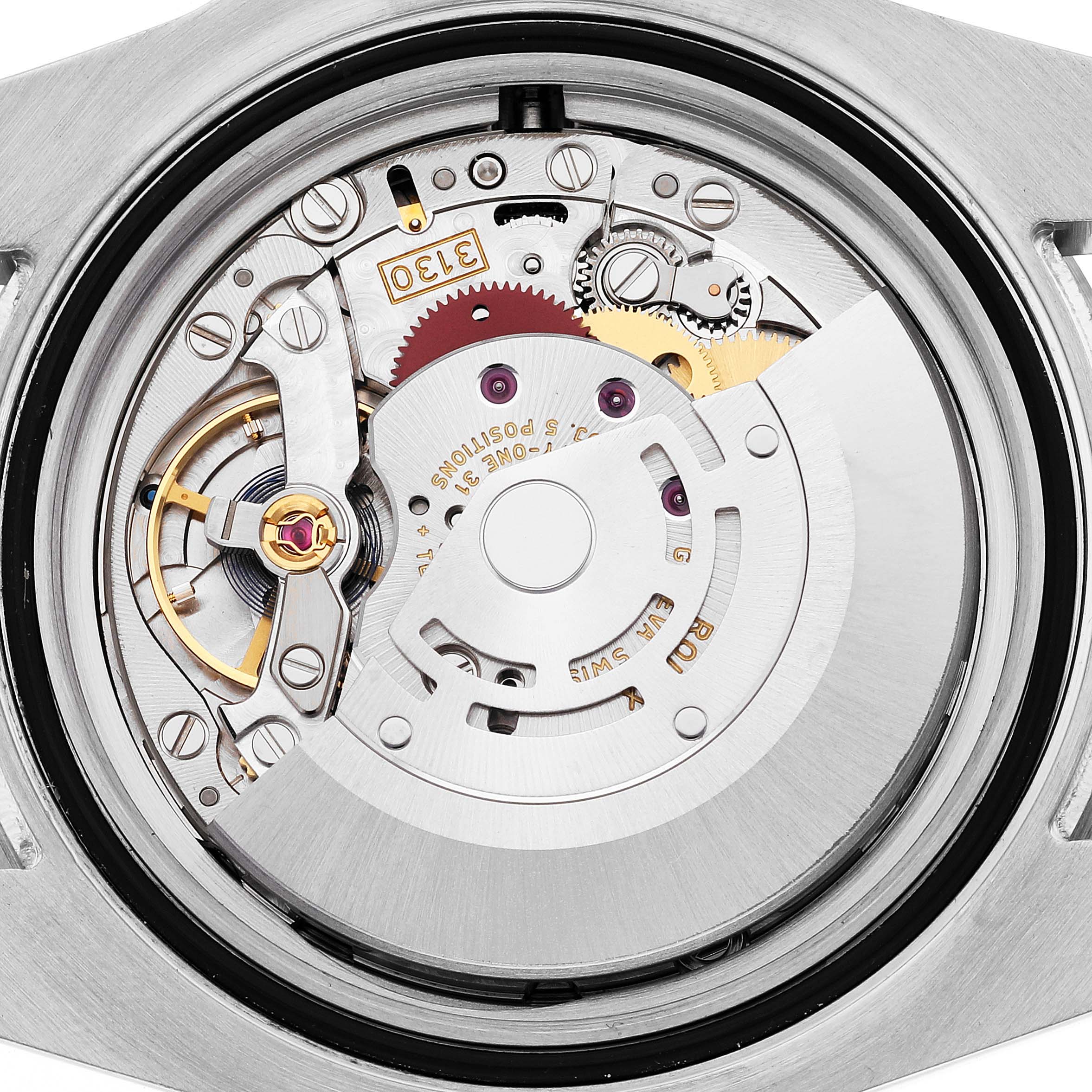 The image shows the internal mechanism and movement of a Rolex Submariner 114060 Men
s Stainless Steel Black Dial 114060 Men
s Stainless Steel Black Dial watch viewed from the back.