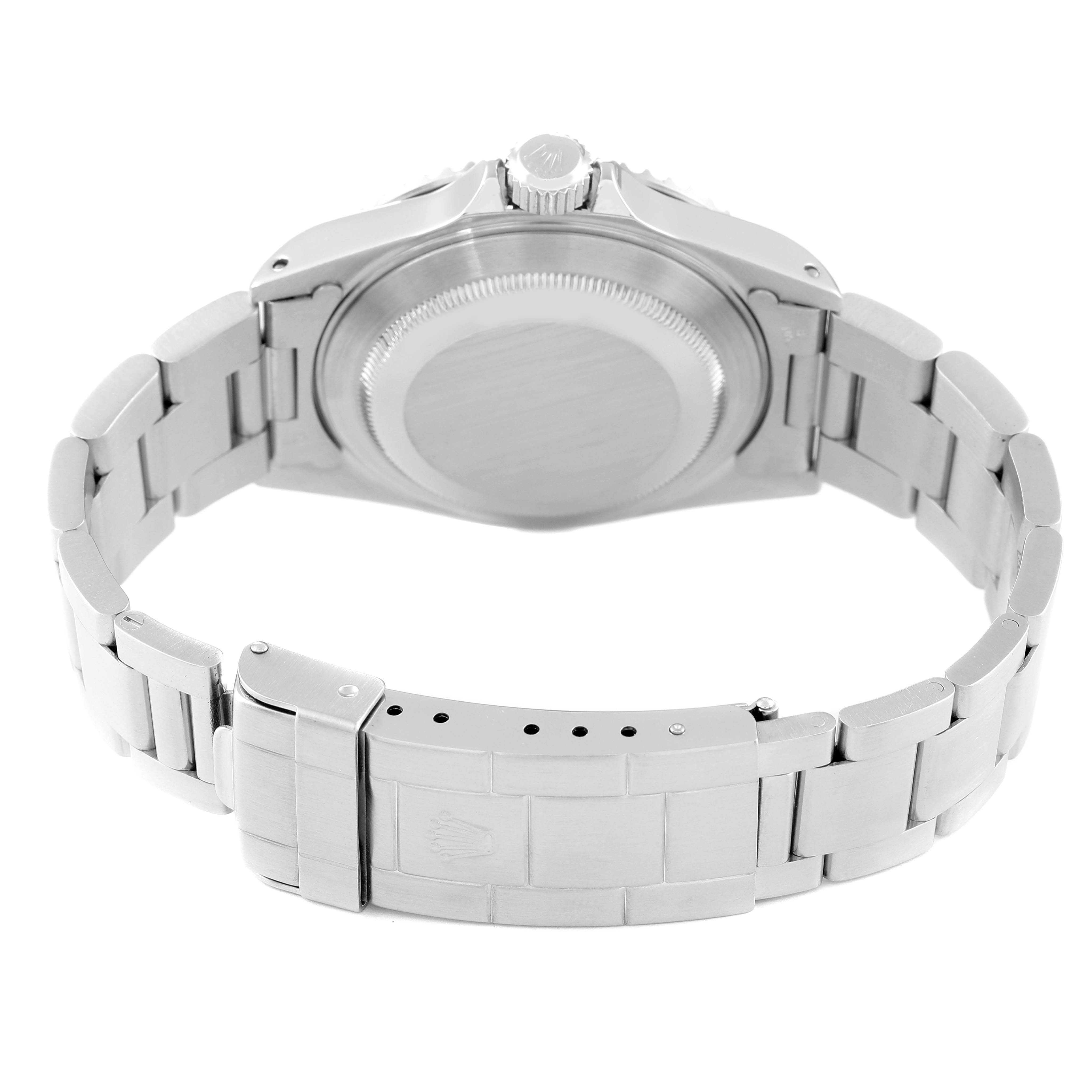 The image shows the back case and bracelet of a Rolex Submariner 14060 Men
s Stainless Steel Black Dial 14060 Men
s Stainless Steel Black Dial watch from a rear angle.