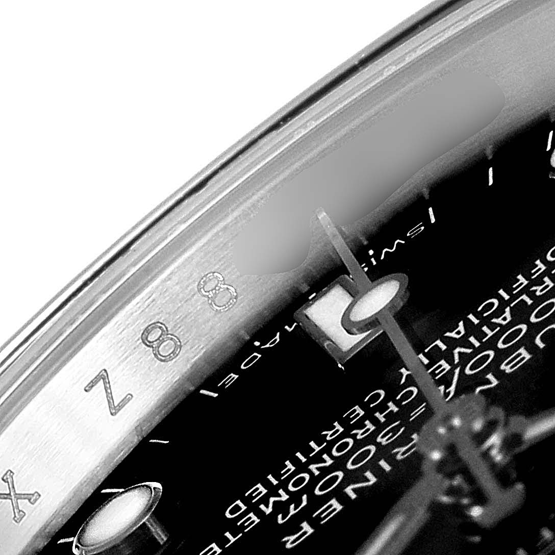 The image shows a close-up of the dial and edge of the case of the Rolex Submariner 14060 Men
s Stainless Steel Black Dial 14060 Men
s Stainless Steel Black Dial watch.