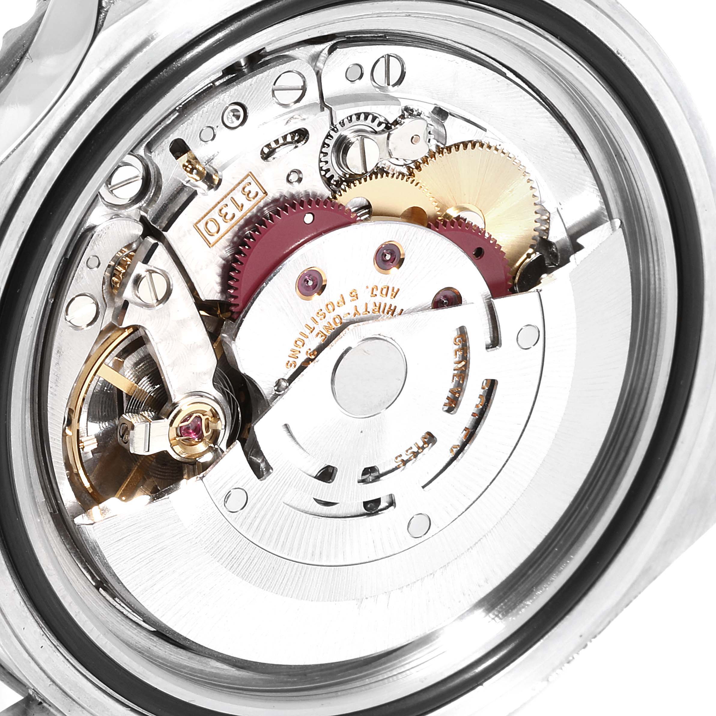 The image shows the internal mechanism of a Rolex Submariner 14060 Men
s Stainless Steel Black Dial 14060 Men
s Stainless Steel Black Dial watch from a close-up angle.