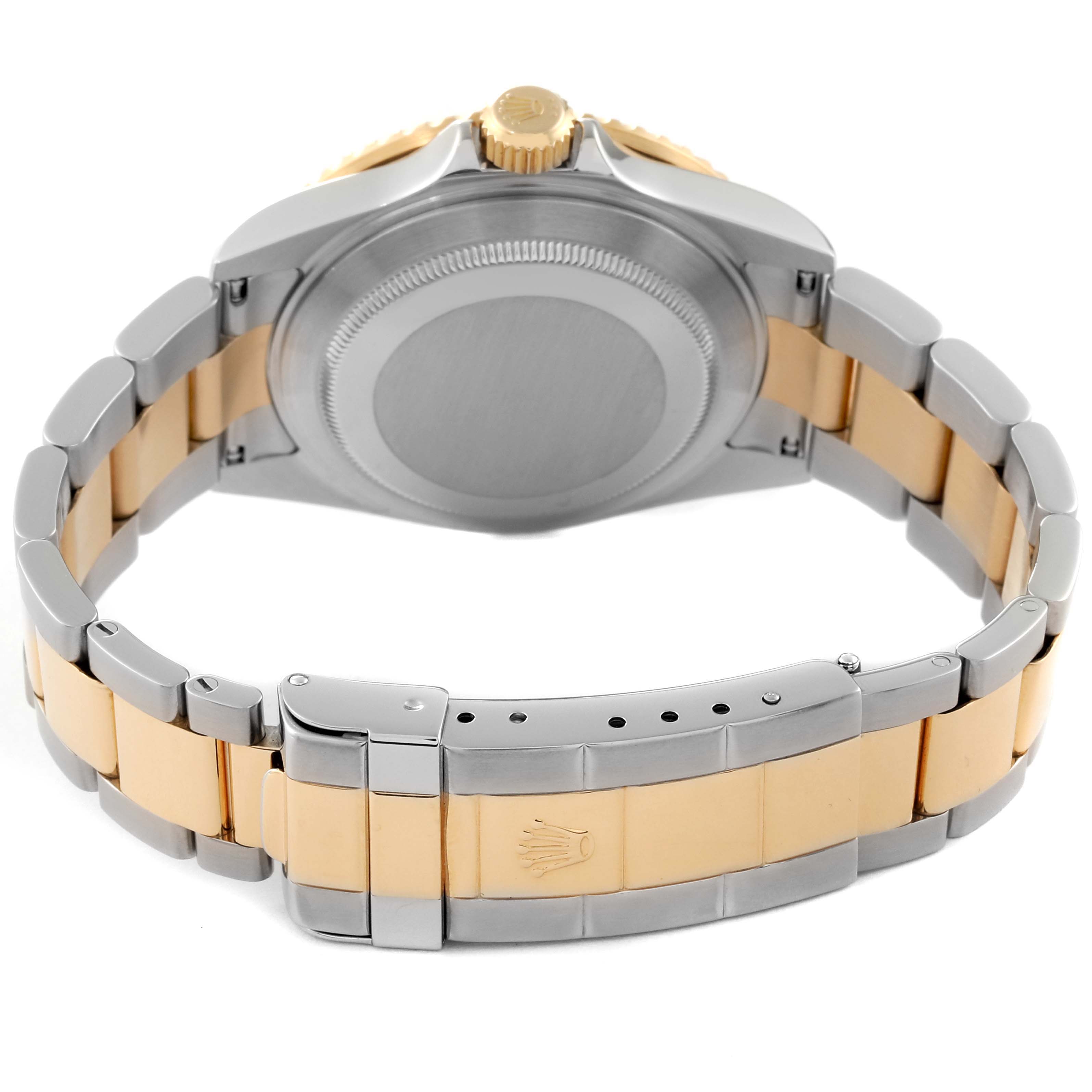 This image shows the back case and stainless steel and gold bracelet of a Rolex Submariner 16613 Men's Steel and Gold (two tone) Grey Dial 16613 Men's Steel and Gold (two tone) Grey Dial watch.