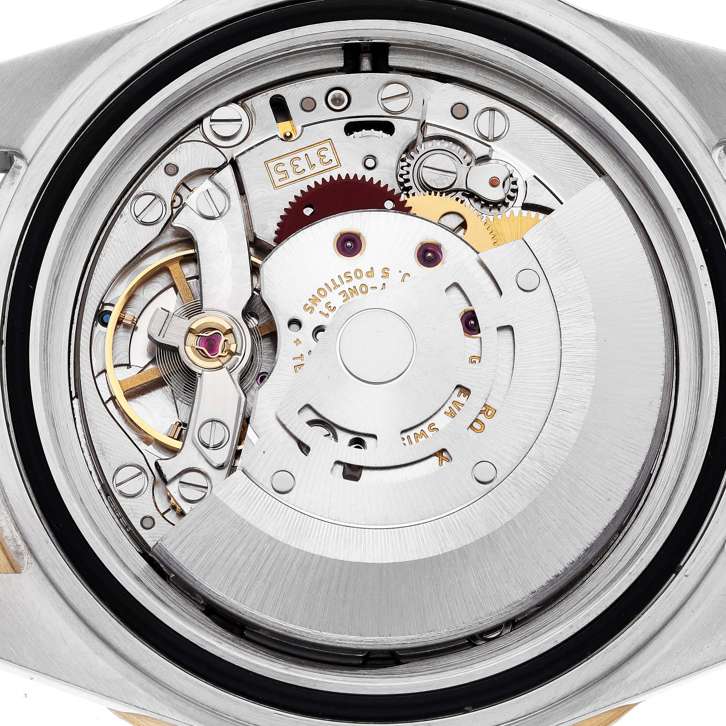 This image shows the internal mechanical movement of a Rolex Submariner 16613 Men's Steel and Gold (two tone) Grey Dial 16613 Men's Steel and Gold (two tone) Grey Dial watch viewed from the back.