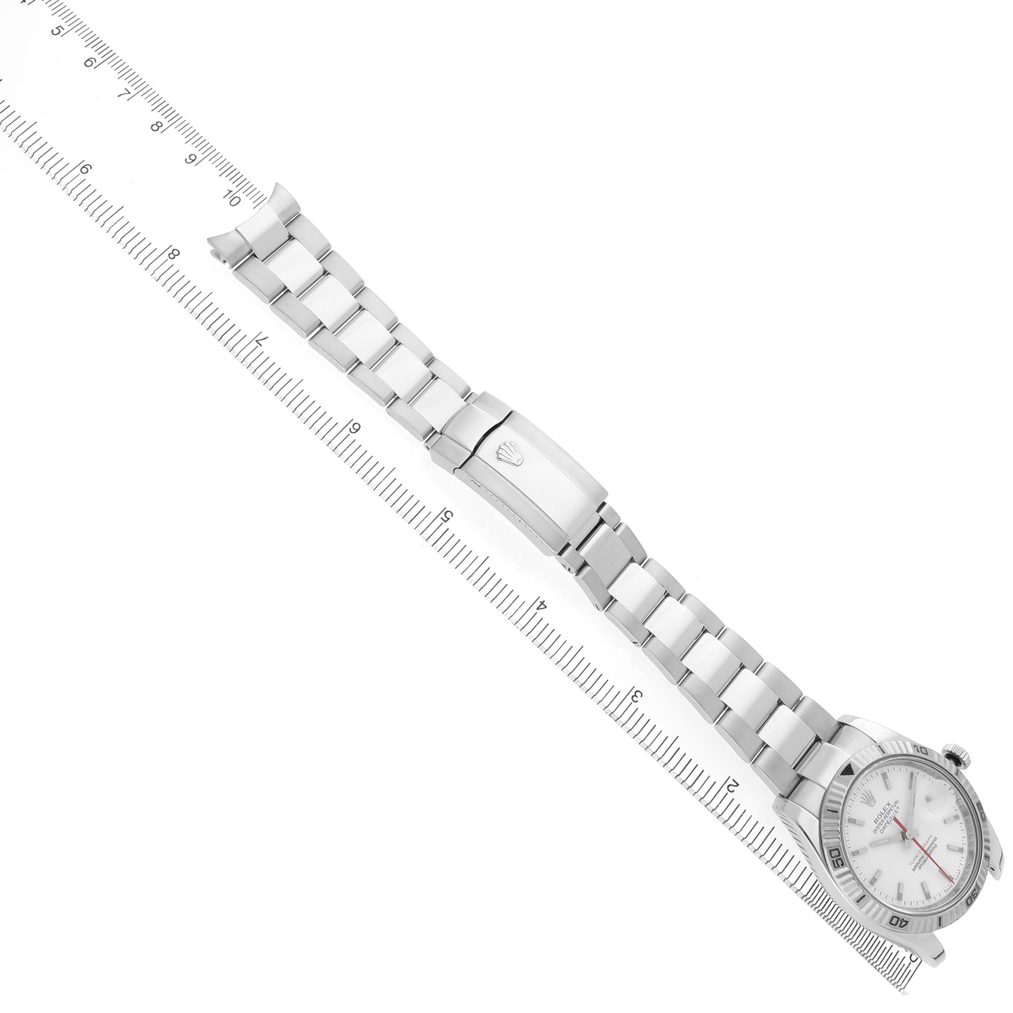 The Rolex Turn-o-Graph 116264 Men's Stainless Steel White Dial watch is shown diagonally from an overhead angle, displaying the full bracelet and clasp.