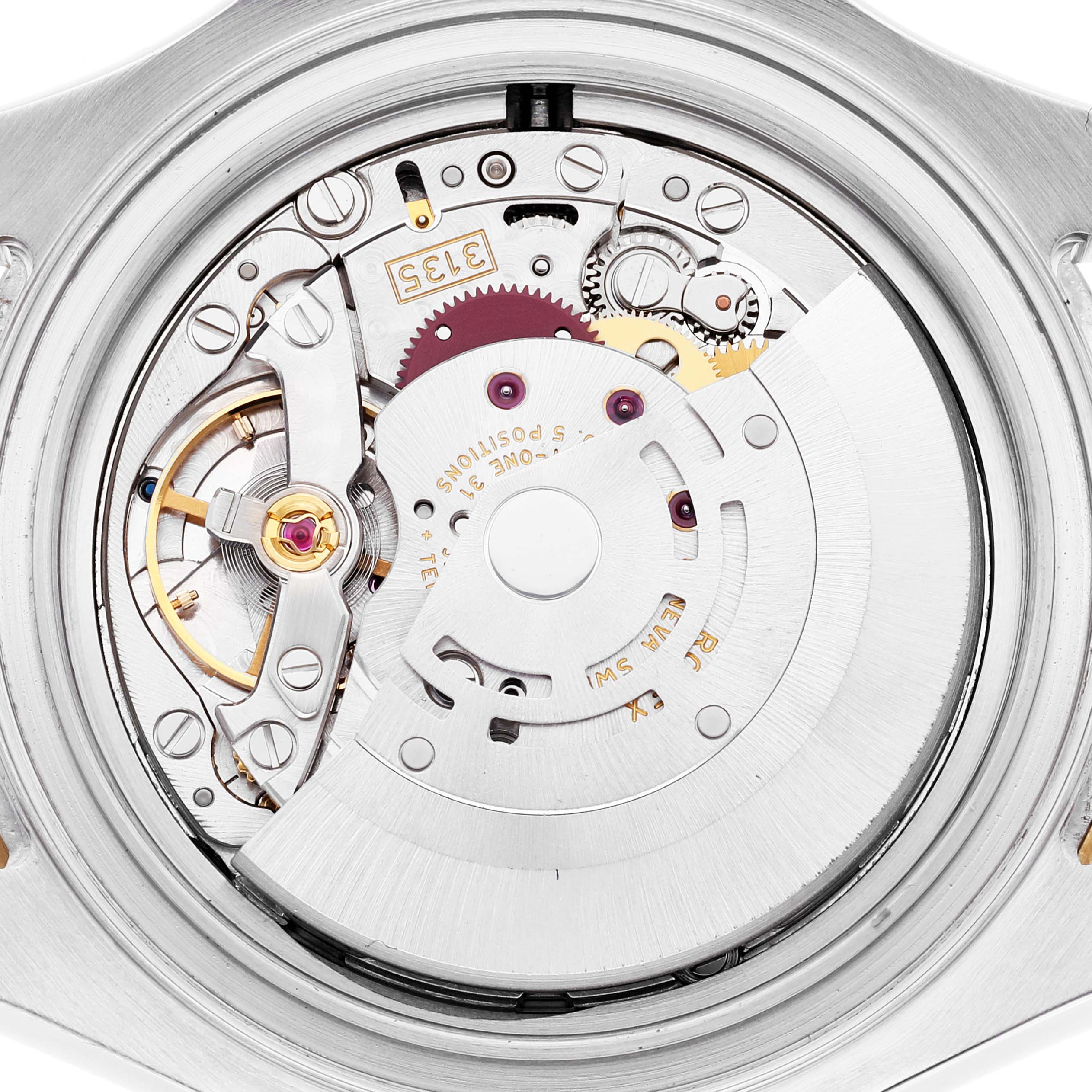 This is a close-up image of the movement and inner mechanics of a Rolex Yacht-Master 16623 Men
s Steel and Gold (two tone) Blue Dial 16623 Men
s Steel and Gold (two tone) Blue Dial watch.
