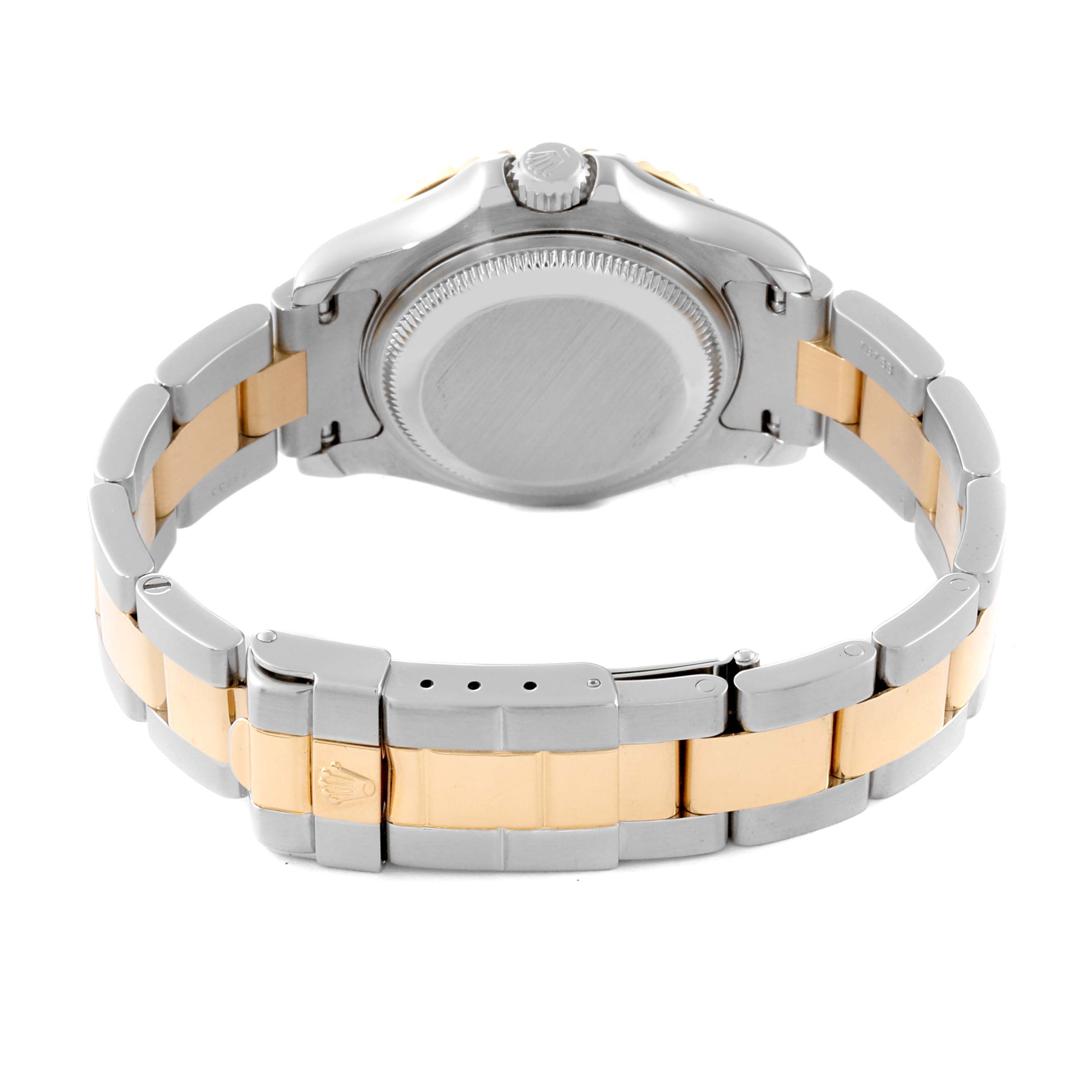 The image shows the back view and bracelet clasp of a Rolex Yacht-Master 69623 Women's Steel and Gold (two tone) Blue Dial 69623 Women's Steel and Gold (two tone) Blue Dial watch, featuring a two-tone metal band.