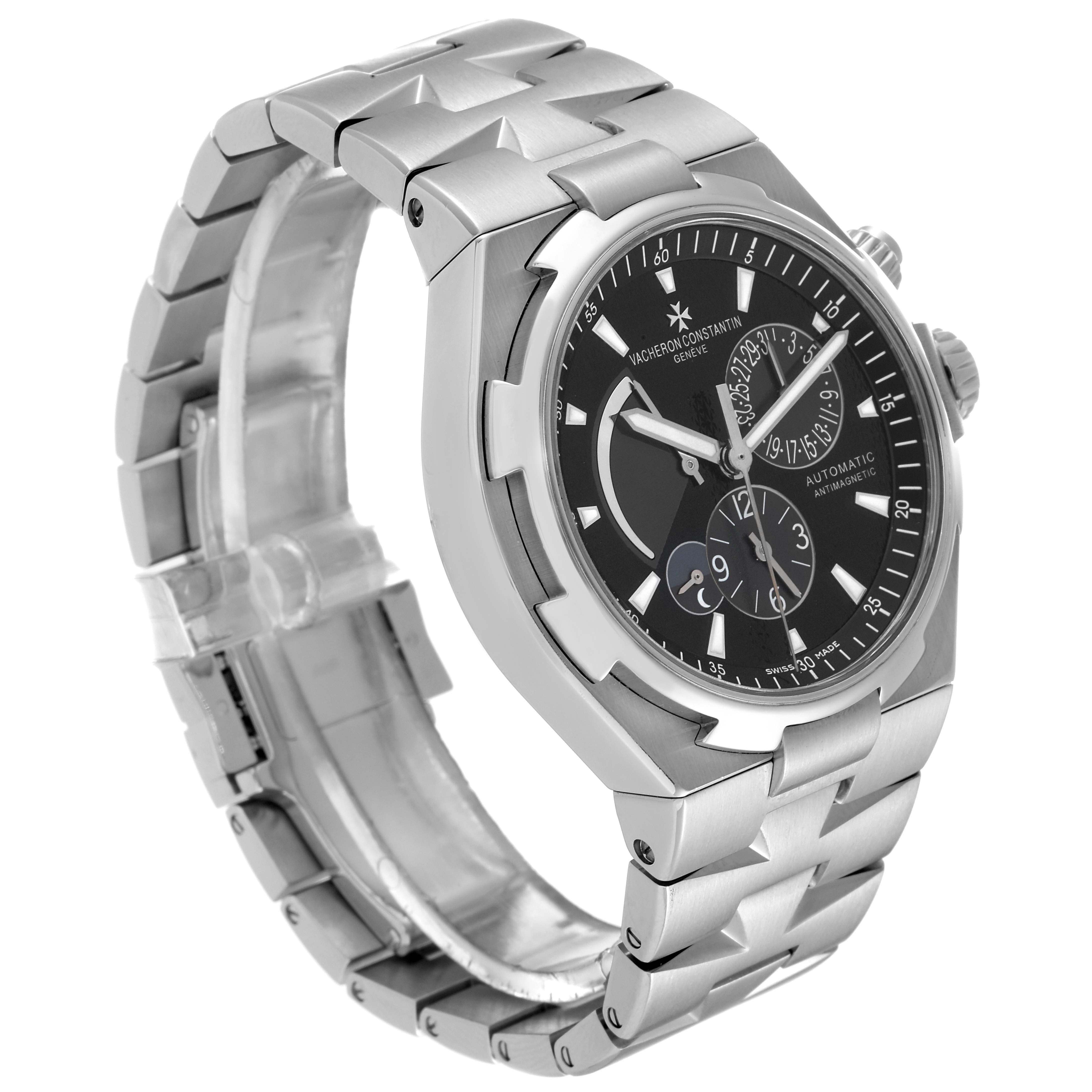 The image shows a side angle view of the Vacheron Constantin Overseas 47450/B01A-9227 Men
s Stainless Steel Black Dial 47450/B01A-9227 Men
s Stainless Steel Black Dial model, highlighting the watch
s face and bracelet.