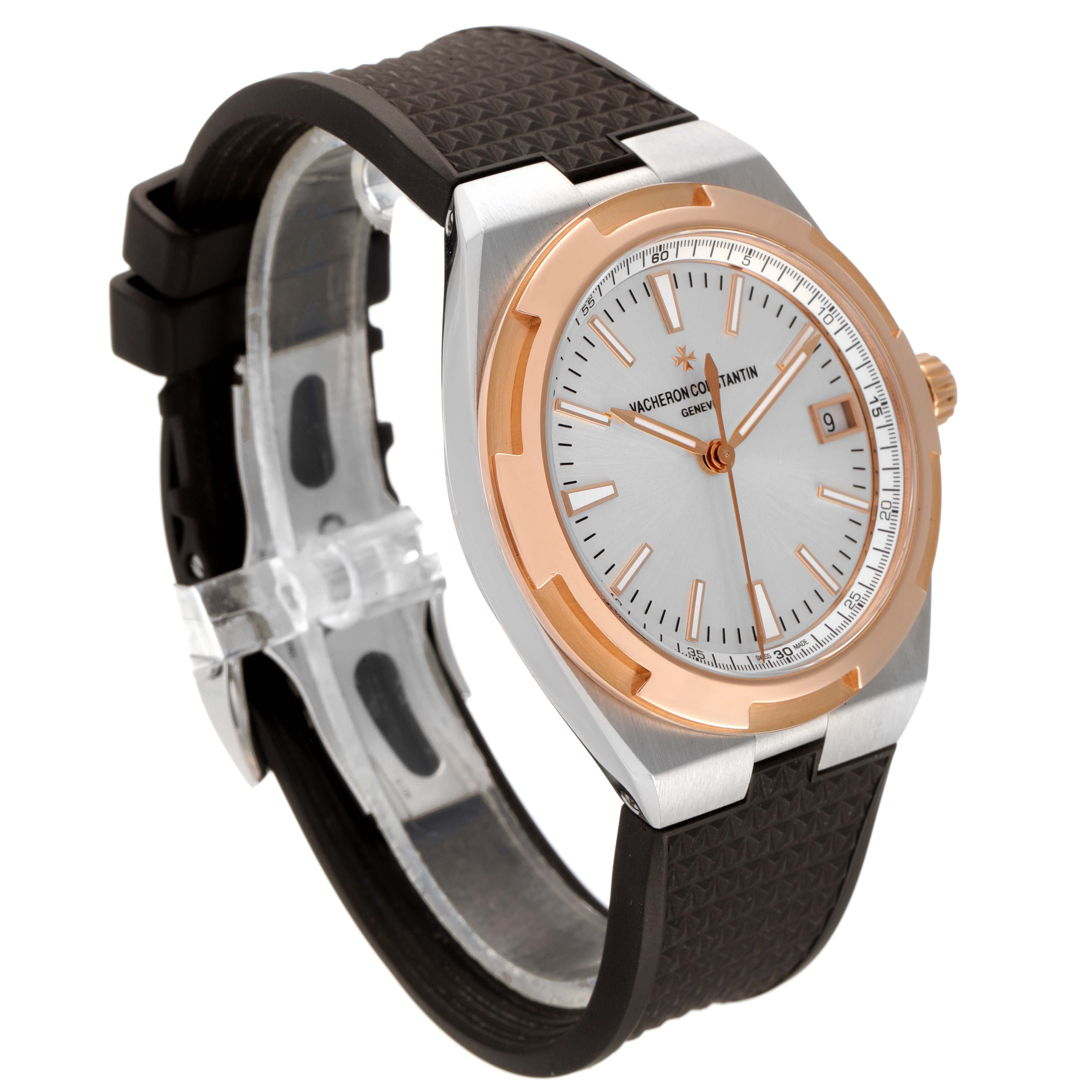 The Vacheron Constantin Overseas 4500V/000M-B127 Men's Steel and Gold (two tone) Silver Dial watch is shown at a three-quarter angle, displaying the face, crown, and textured strap.