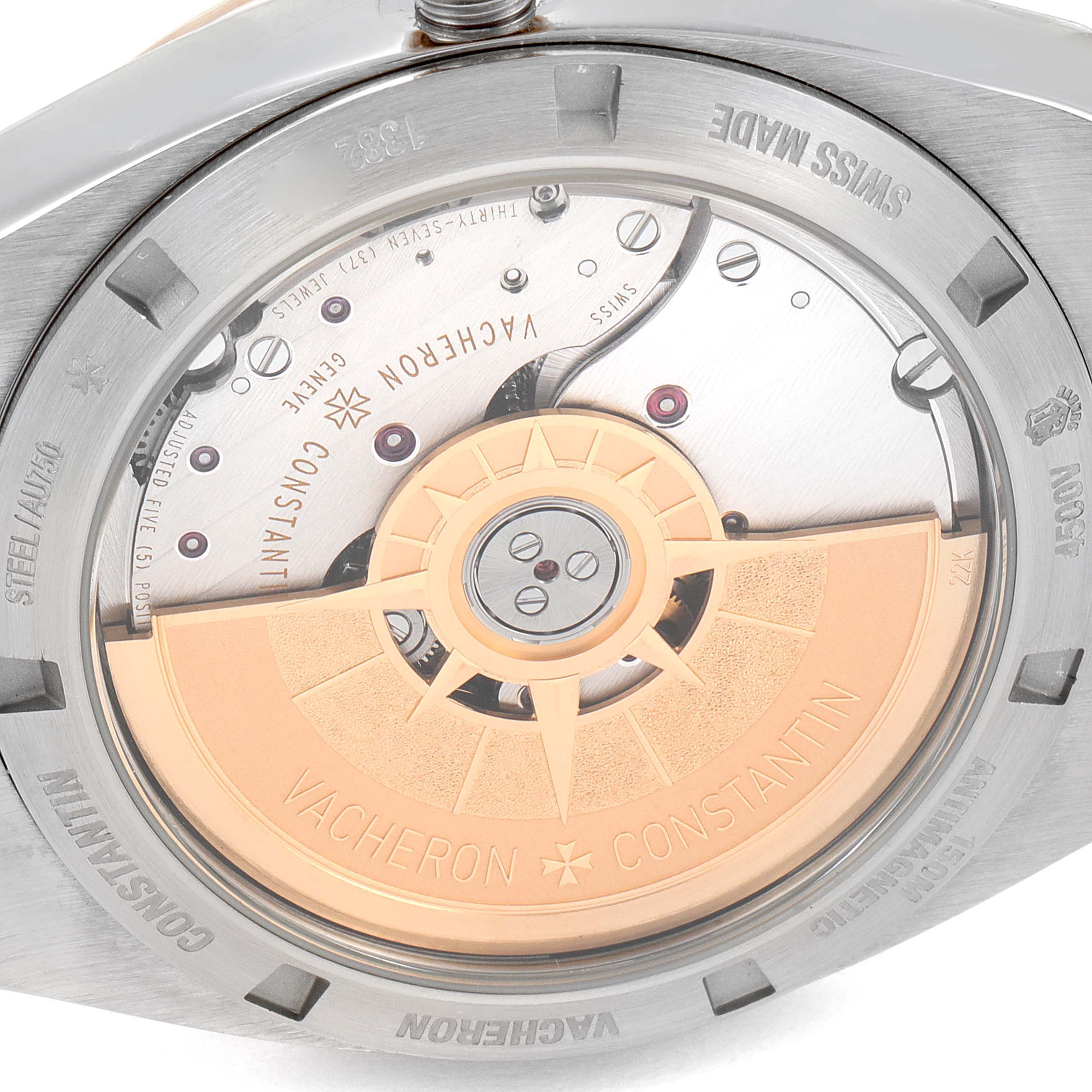 The image shows the back view of a Vacheron Constantin Overseas 4500V/000M-B127 Men's Steel and Gold (two tone) Silver Dial watch, highlighting its automatic movement and rotor.