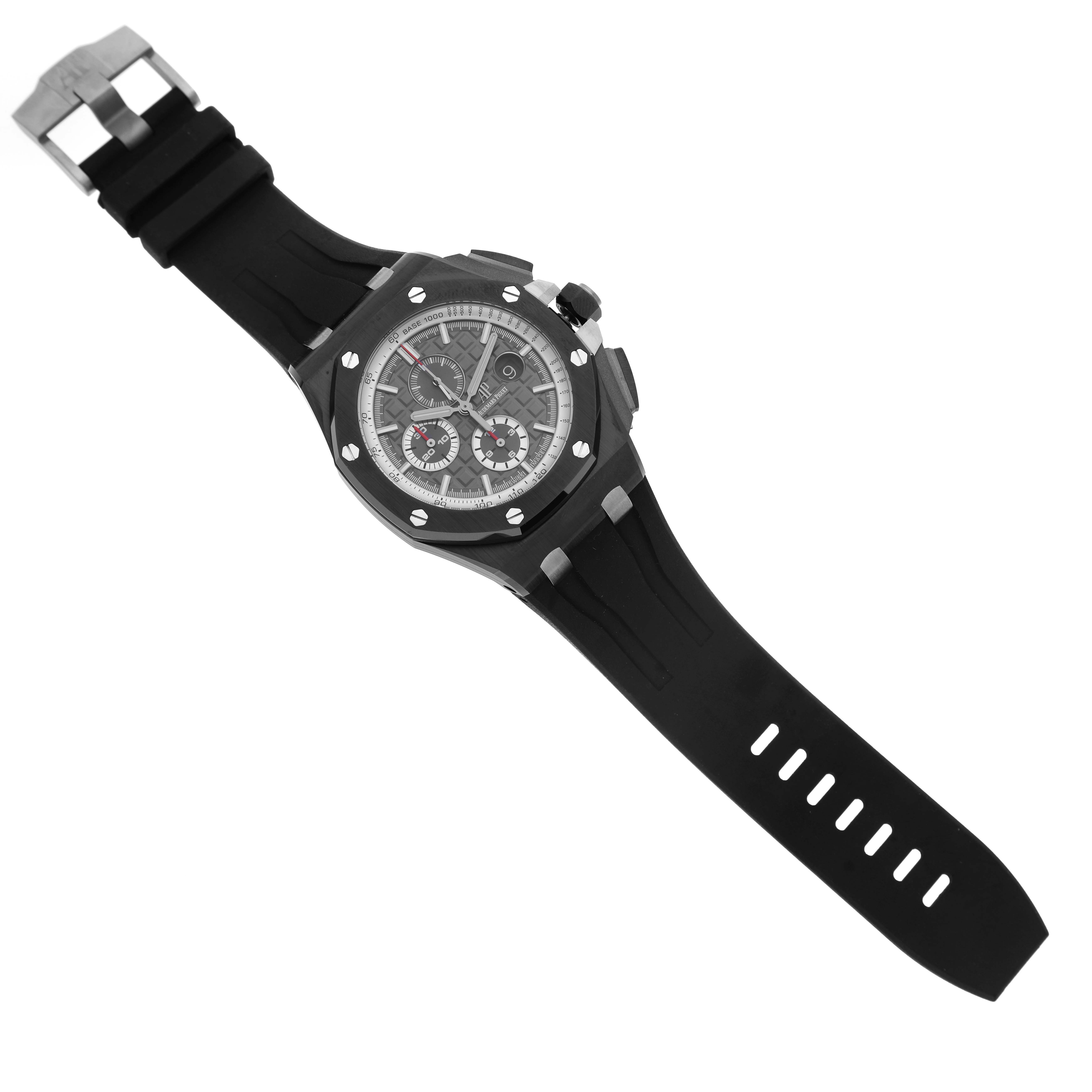 The Audemars Piguet Royal Oak Offshore 26405CE Men's Ceramic Grey Dial watch is shown from a top angle, highlighting the face, bezel, and full strap.