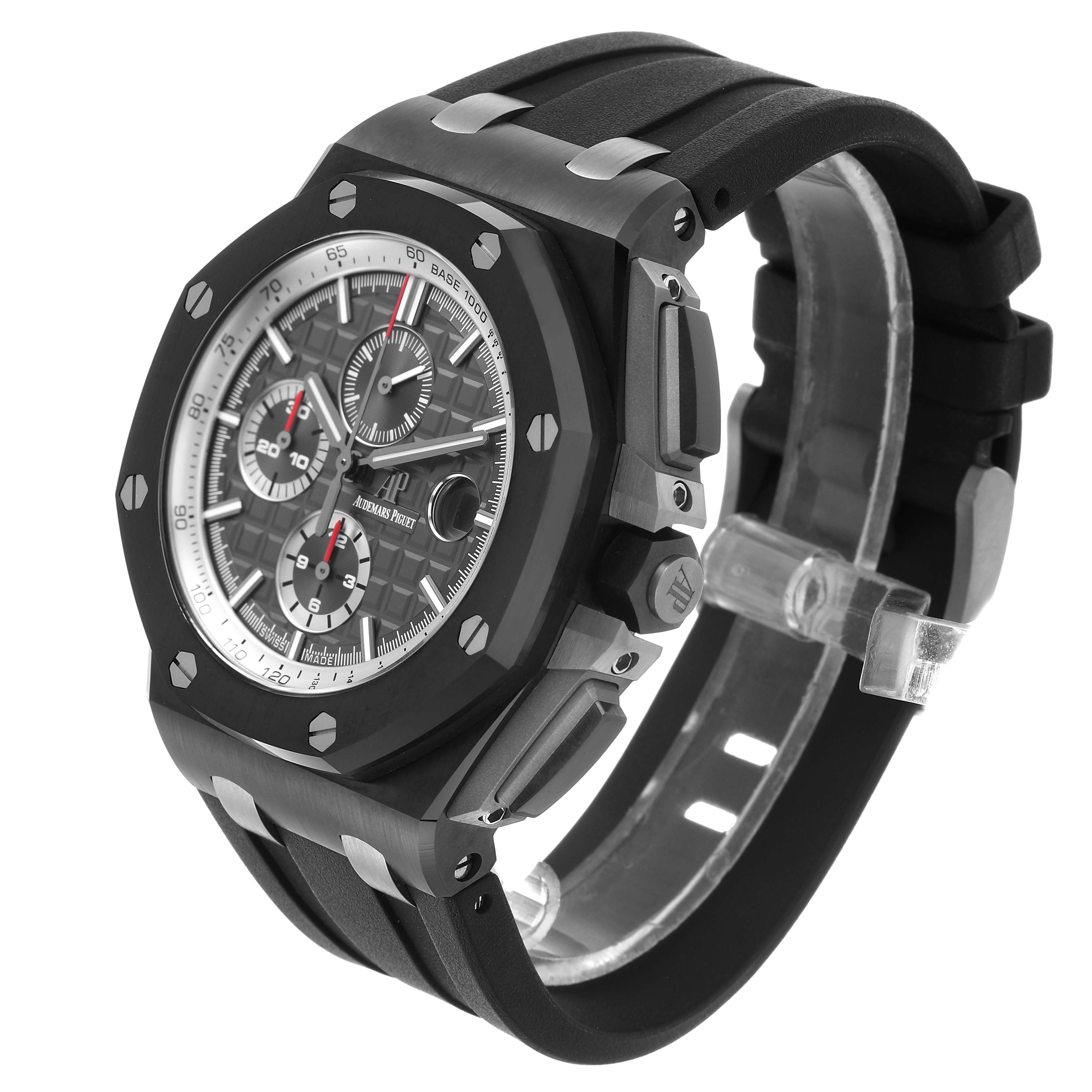 The Audemars Piguet Royal Oak Offshore 26405CE Men's Ceramic Grey Dial is shown at a three-quarter angle, highlighting the bezel, dial, and rubber strap.