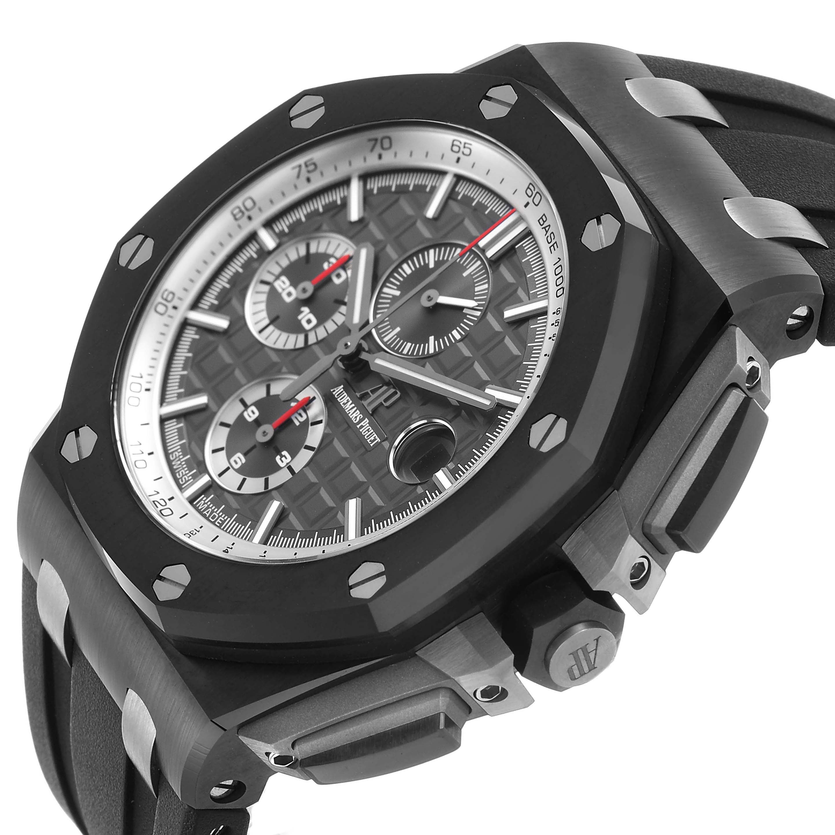 The image shows a side-angle view of the Audemars Piguet Royal Oak Offshore 26405CE Men's Ceramic Grey Dial, highlighting the bezel, chronograph dials, and pushers.