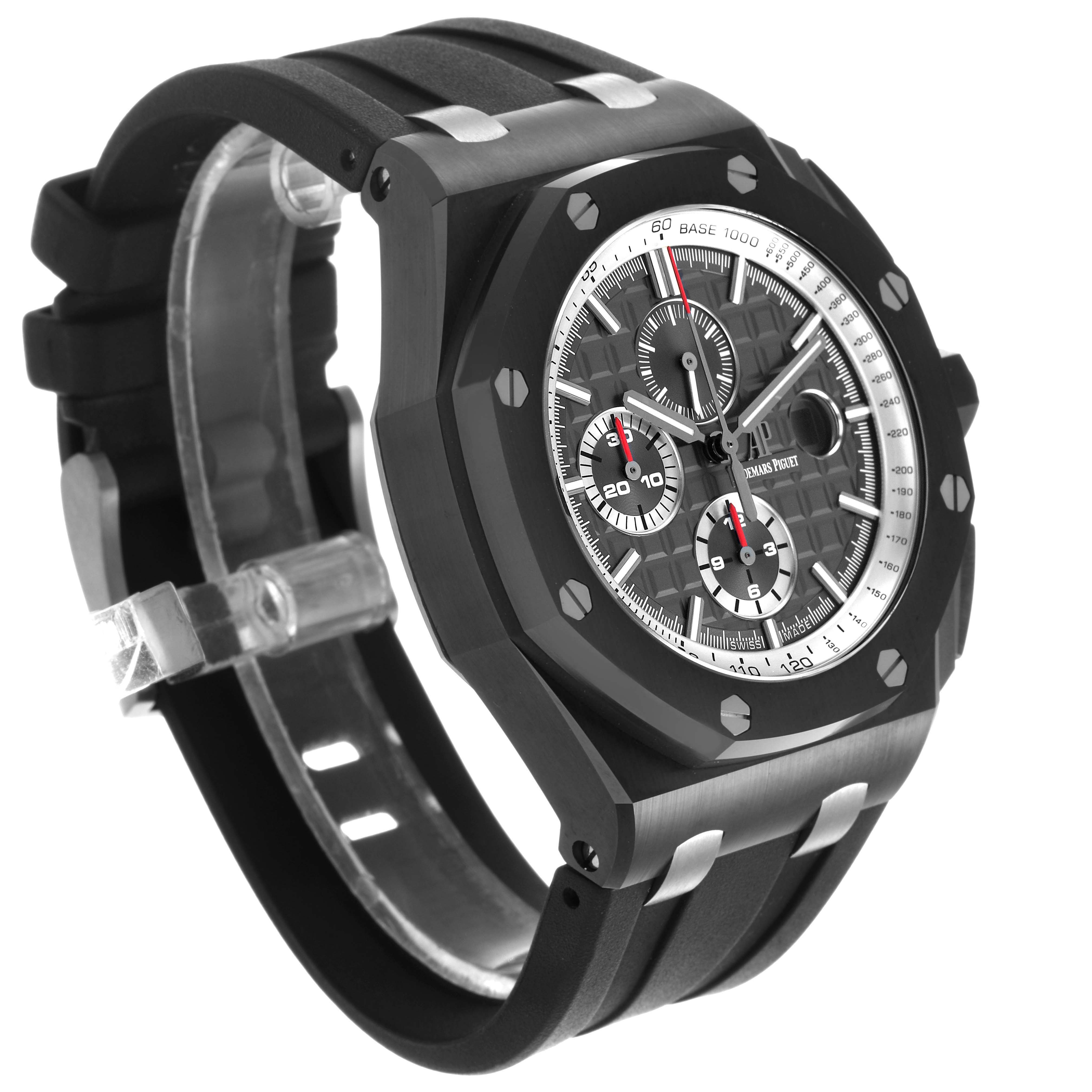 The image shows a side and front angle of the Audemars Piguet Royal Oak Offshore 26405CE Men's Ceramic Grey Dial, highlighting the bezel, dial, and strap.