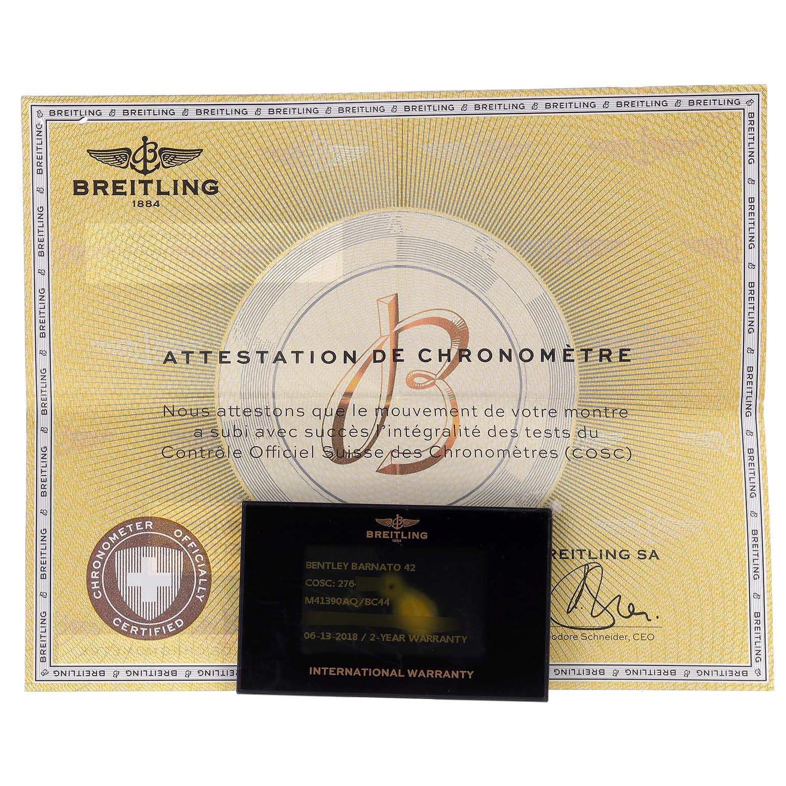 The image shows a Breitling Bentley M41390 Men's Stainless Steel Black Dial M41390 Men's Stainless Steel Black Dial chronometer certificate and an international warranty card for the Bentley Barnato 42 model.