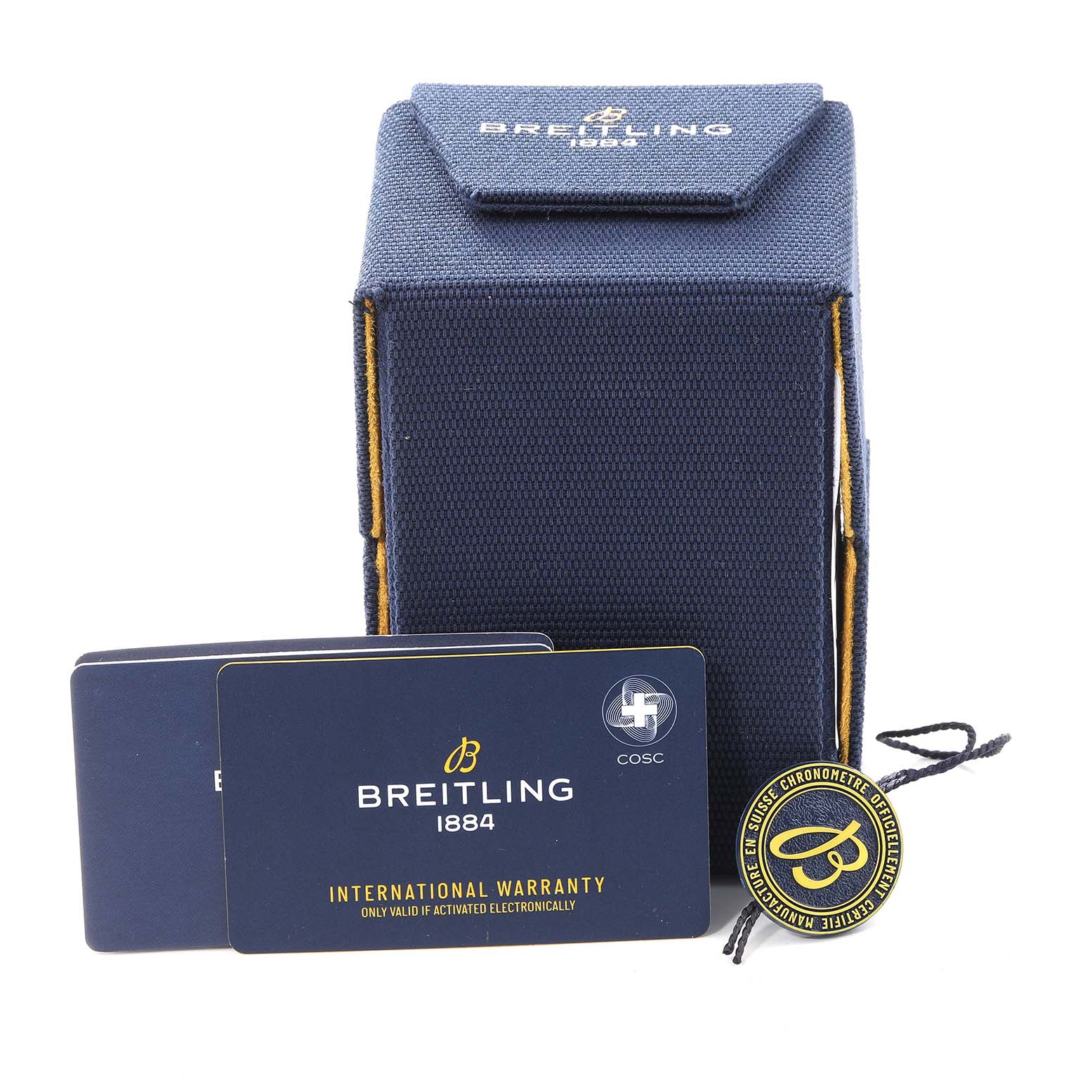 This image shows the packaging, warranty cards, and a tag for the Breitling Navitimer U17325 Men
s Stainless Steel Silver Dial U17325 Men
s Stainless Steel Silver Dial watch.