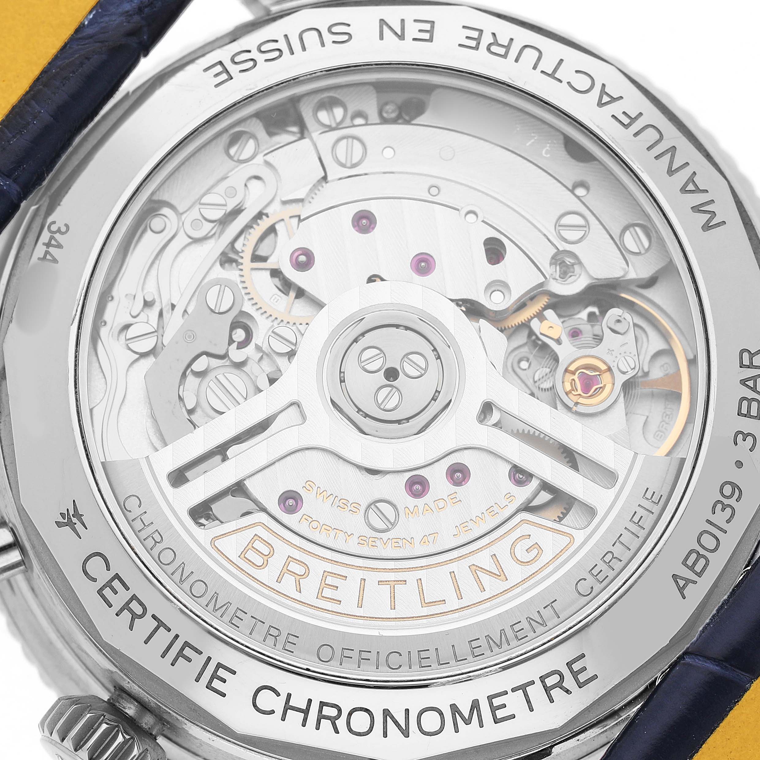 The image shows the back of a Breitling Navitimer AB0139 Men's Stainless Steel Blue Dial watch, displaying its intricate automatic movement.