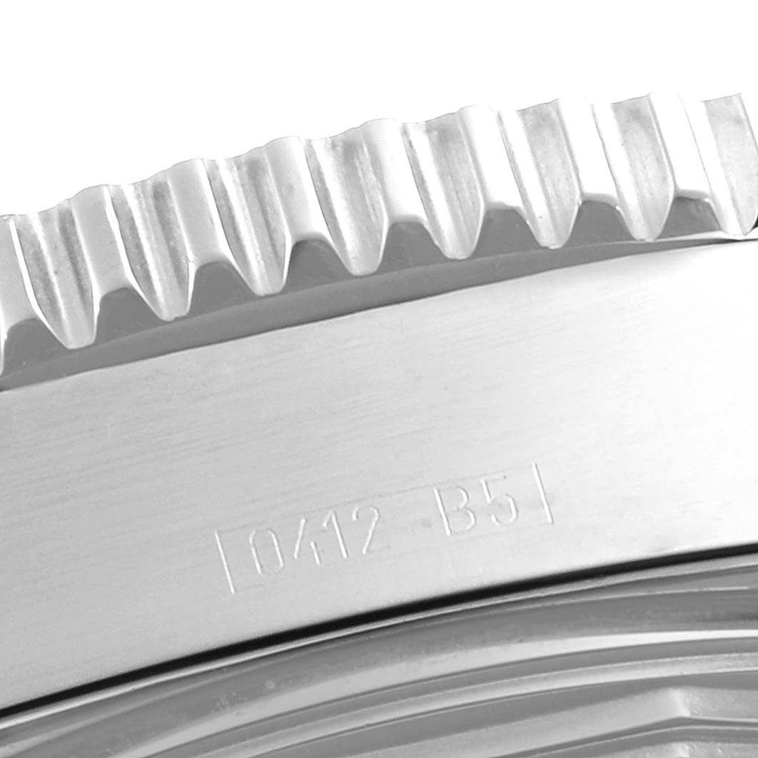 This close-up image shows the edge of the bezel and case back of a Breitling Superocean C17391 Men's Steel and Gold (two tone) Black Dial C17391 Men's Steel and Gold (two tone) Black Dial watch.