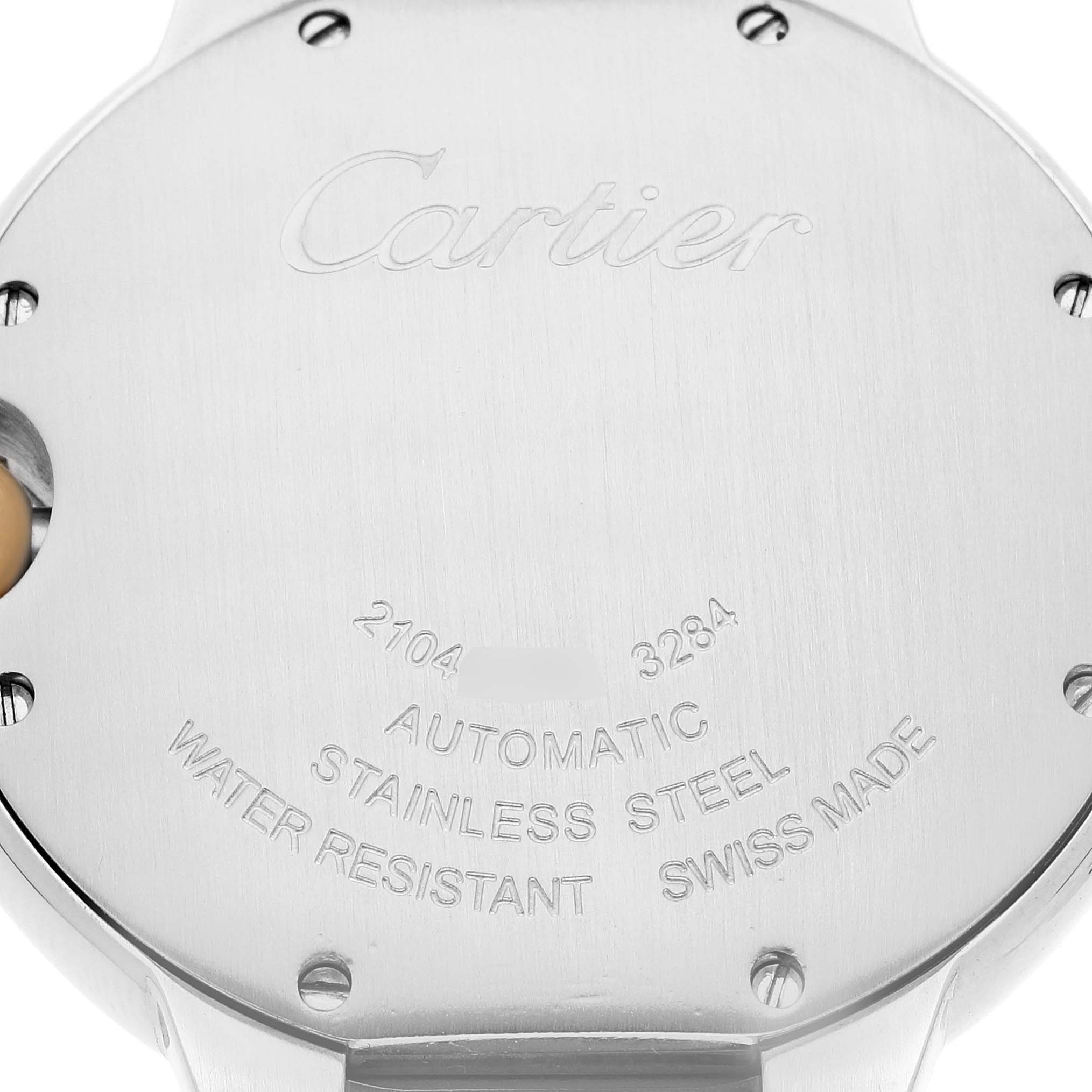 The image shows the back case of a Cartier Ballon Bleu W2BB0012 Women
s Steel and Gold (two tone) Silver Dial W2BB0012 Women
s Steel and Gold (two tone) Silver Dial watch with engravings indicating material and specifications.