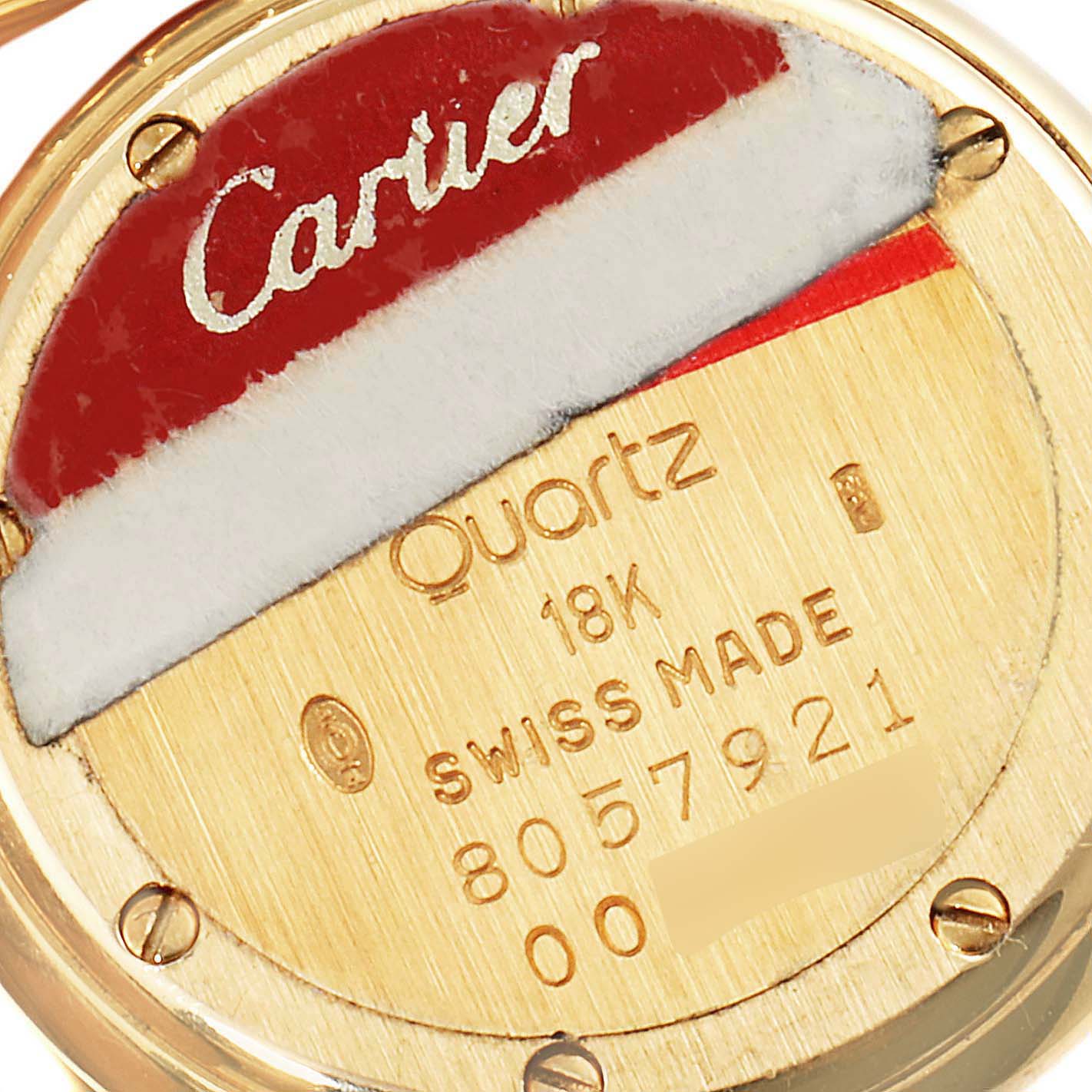 The image shows the back casing of a Cartier Panthere 6692 Women's Yellow Gold Silver Dial 6692 Women's Yellow Gold Silver Dial quartz watch, highlighting the engraving details and Swiss-made mark.