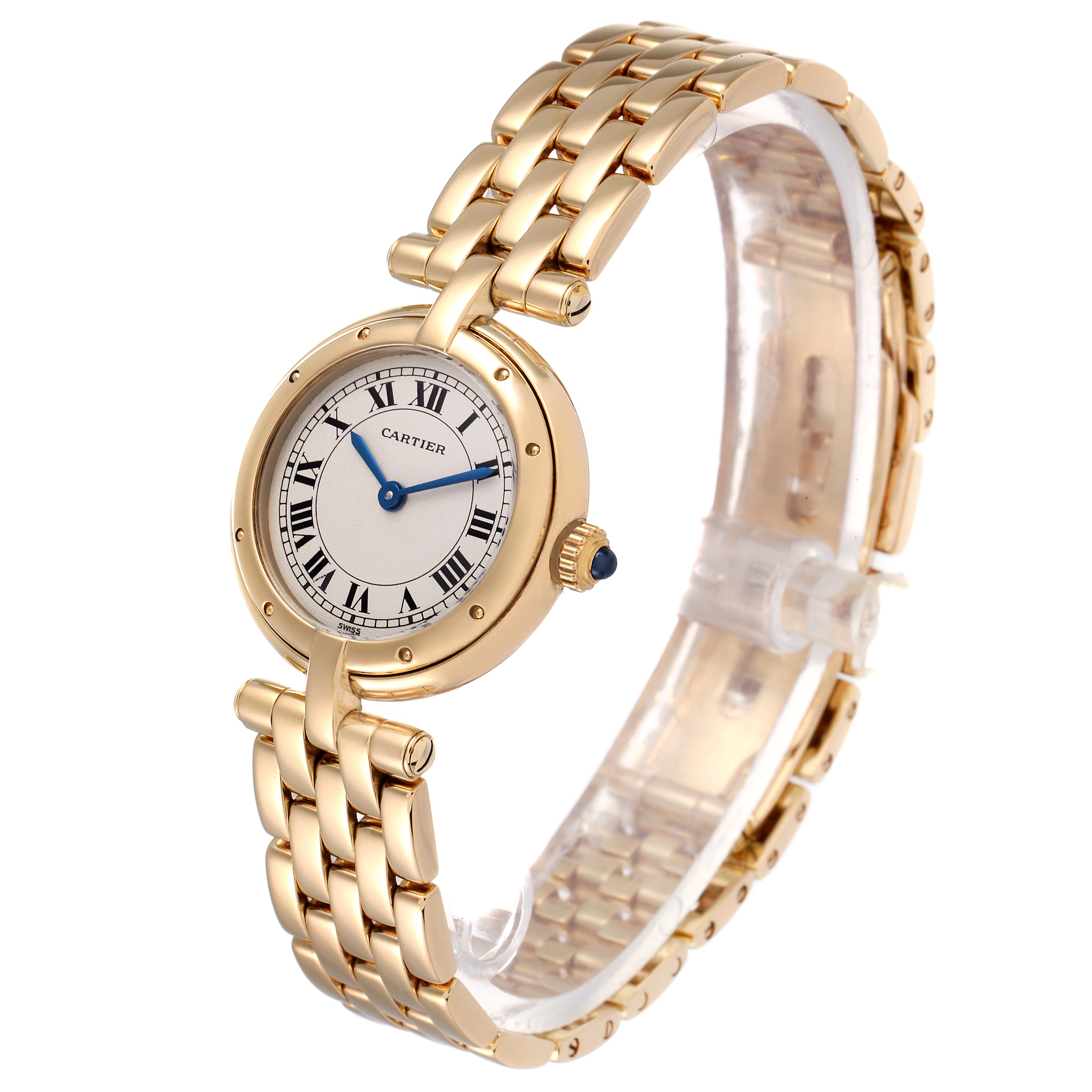 The image shows a Panthere model by Cartier at a three-quarter angle, highlighting its gold bracelet and round dial.