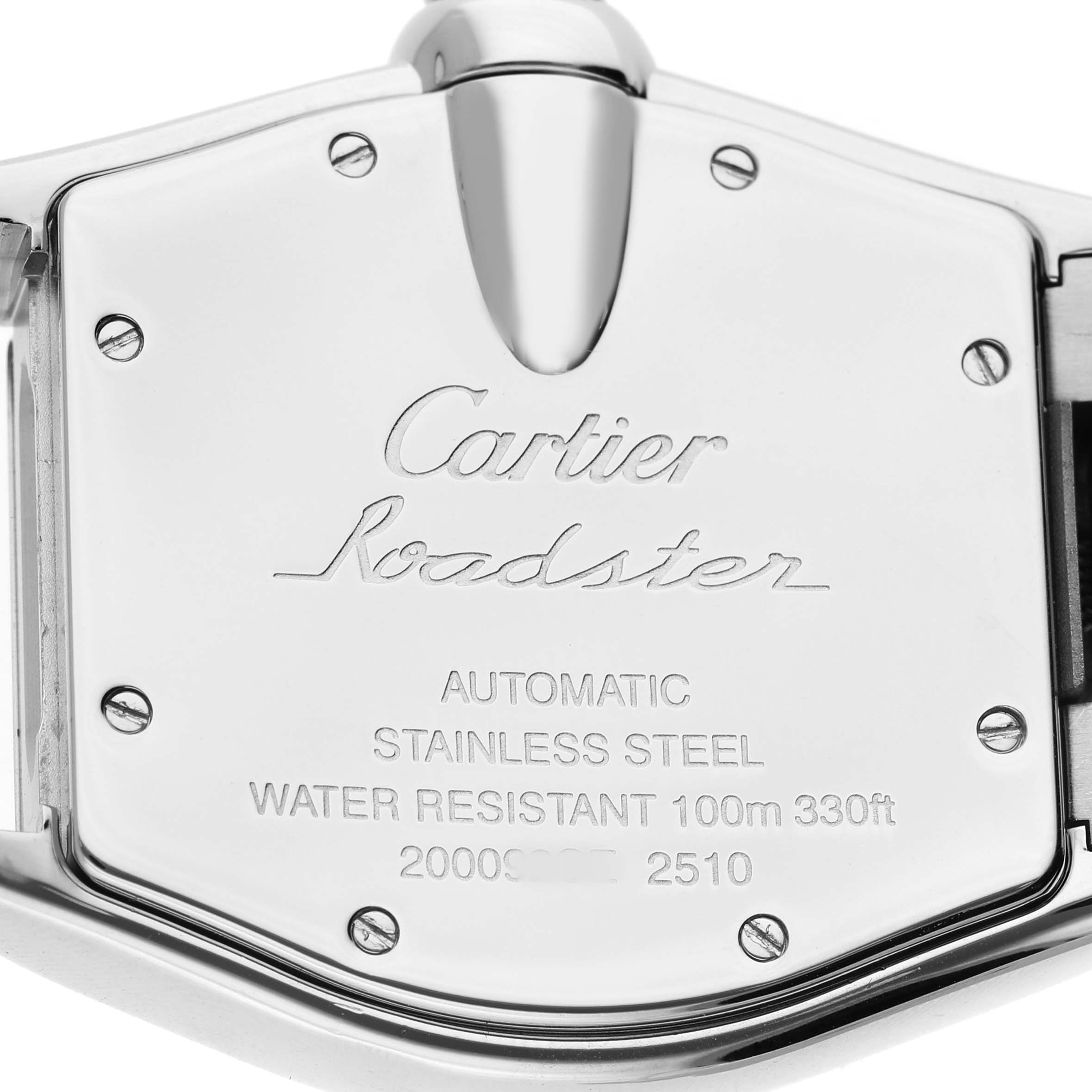 The image shows the back of a Cartier Roadster W62002V3 Men's Stainless Steel Black Dial watch, highlighting its stainless steel case and engraved details.