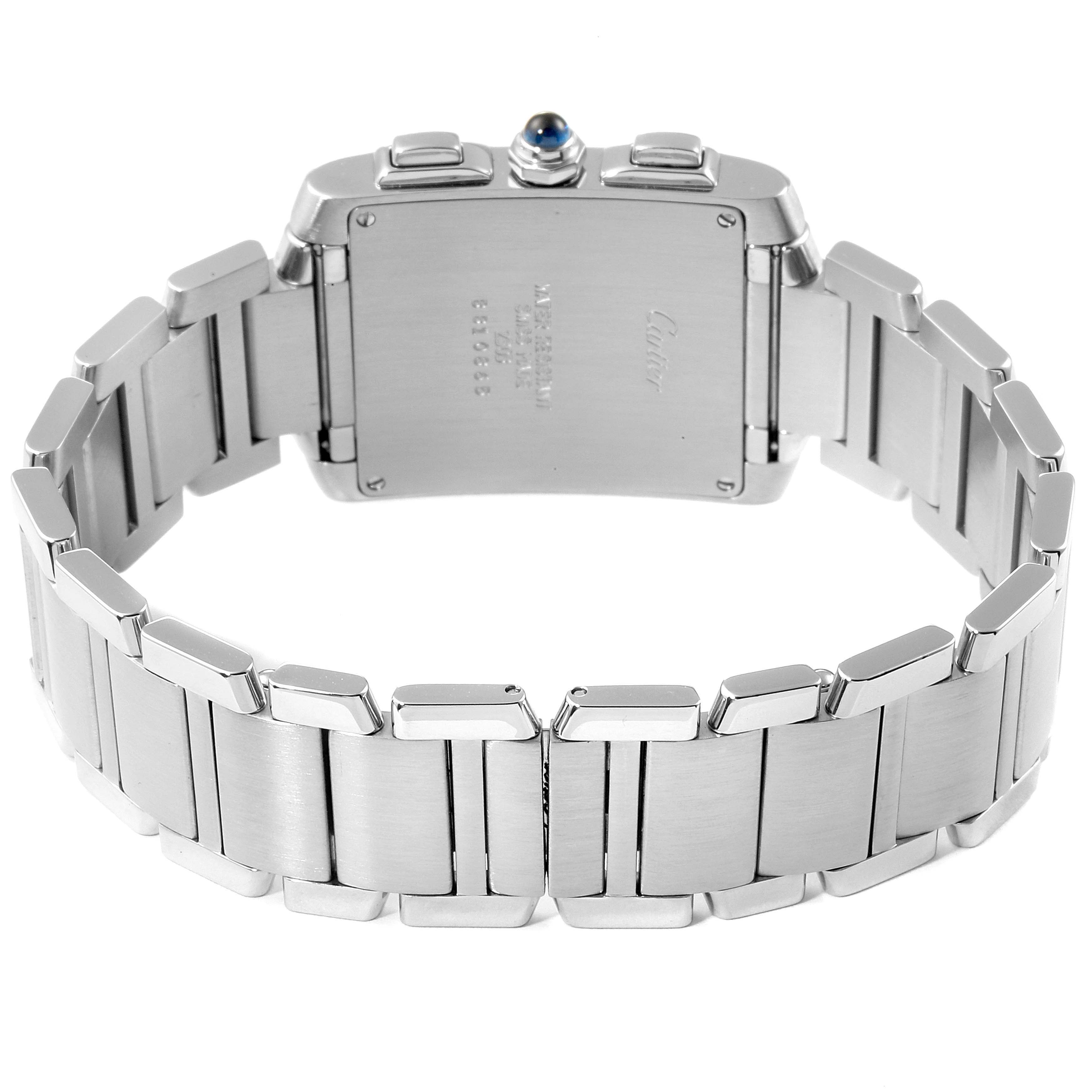 The image shows the back view of a Tank Francaise model by Cartier, featuring its stainless steel case and bracelet.