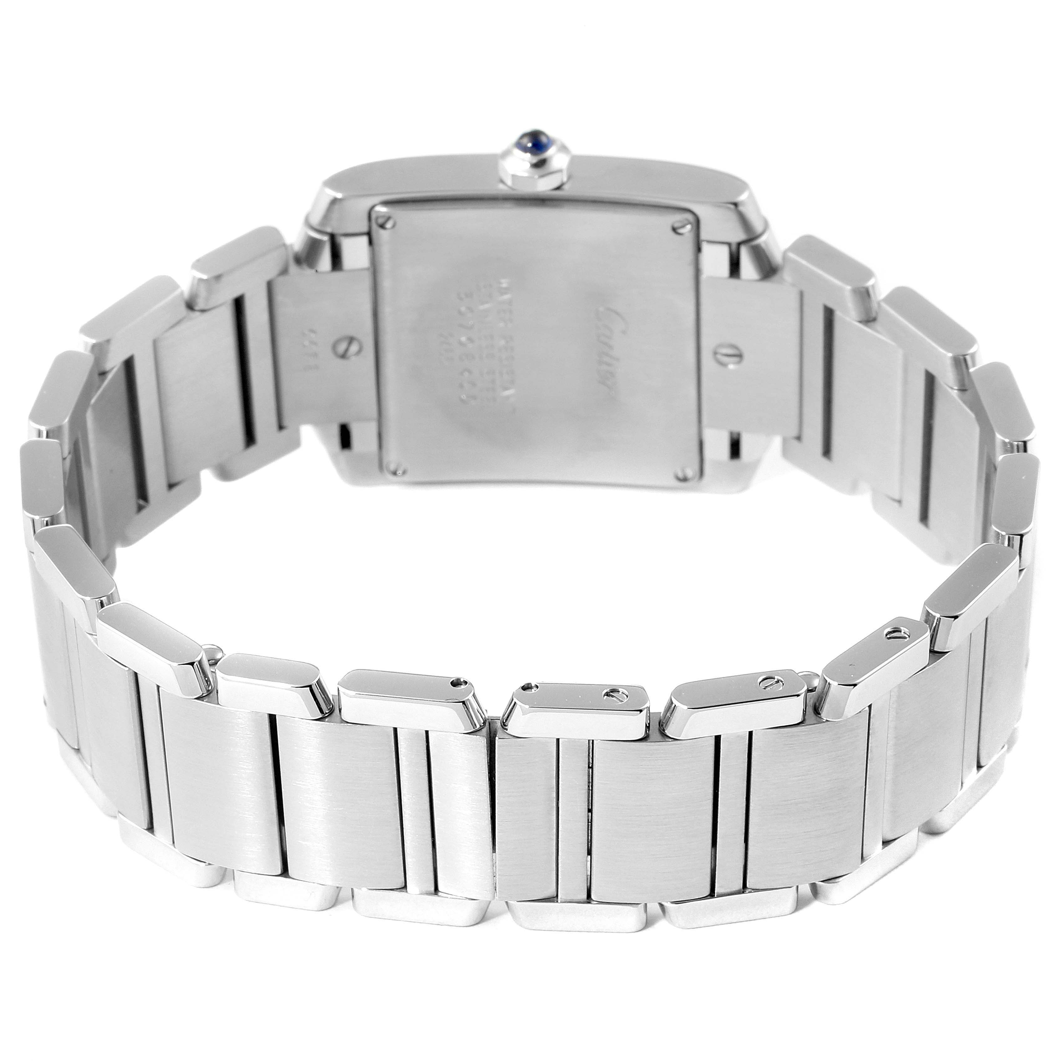 The image shows the back of a Cartier Tank Francaise W51011Q3 Women's Stainless Steel Silver Dial W51011Q3 Women's Stainless Steel Silver Dial watch, highlighting its stainless steel bracelet and case.