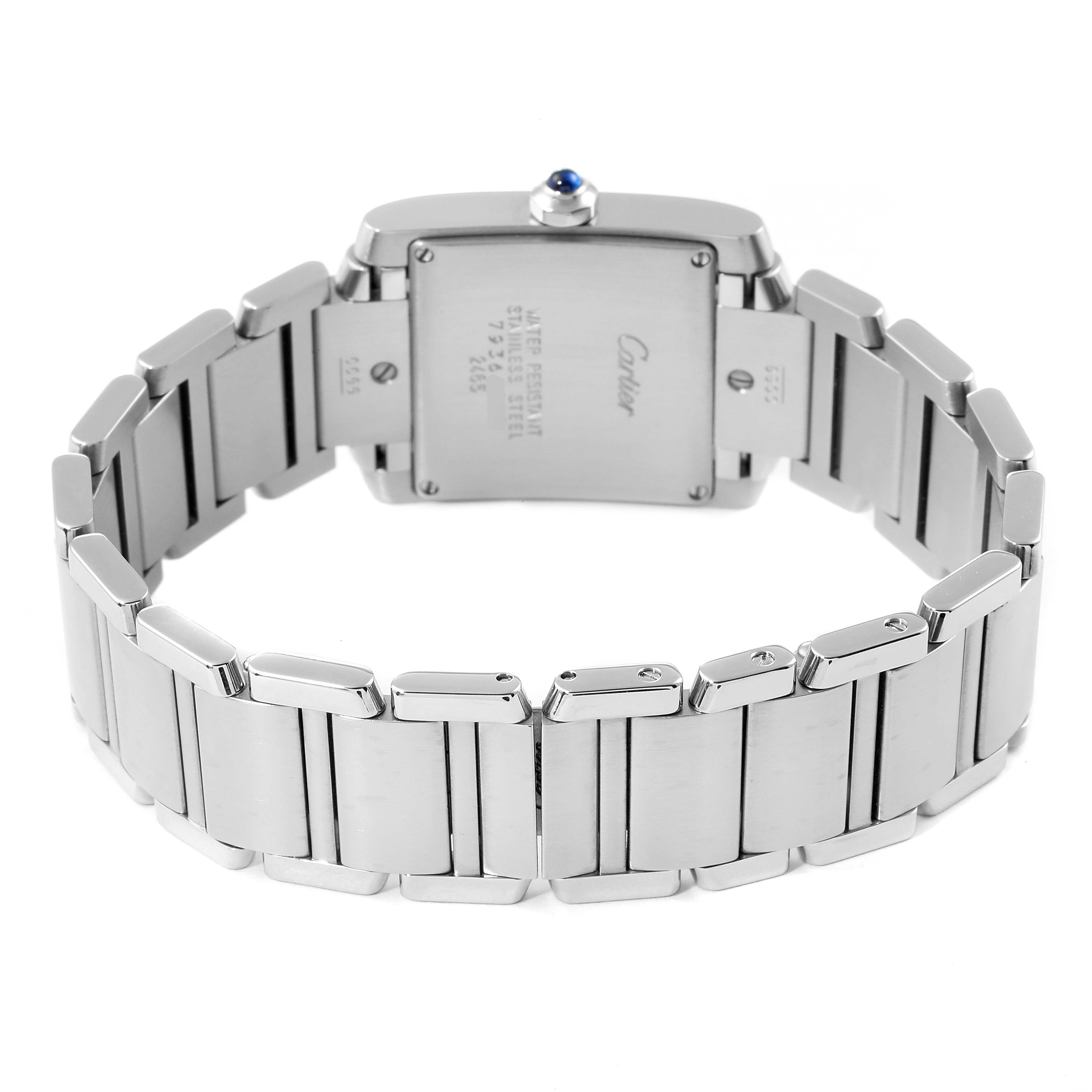 The image shows the back of a Tank Française watch by Cartier, focusing on the bracelet and caseback.