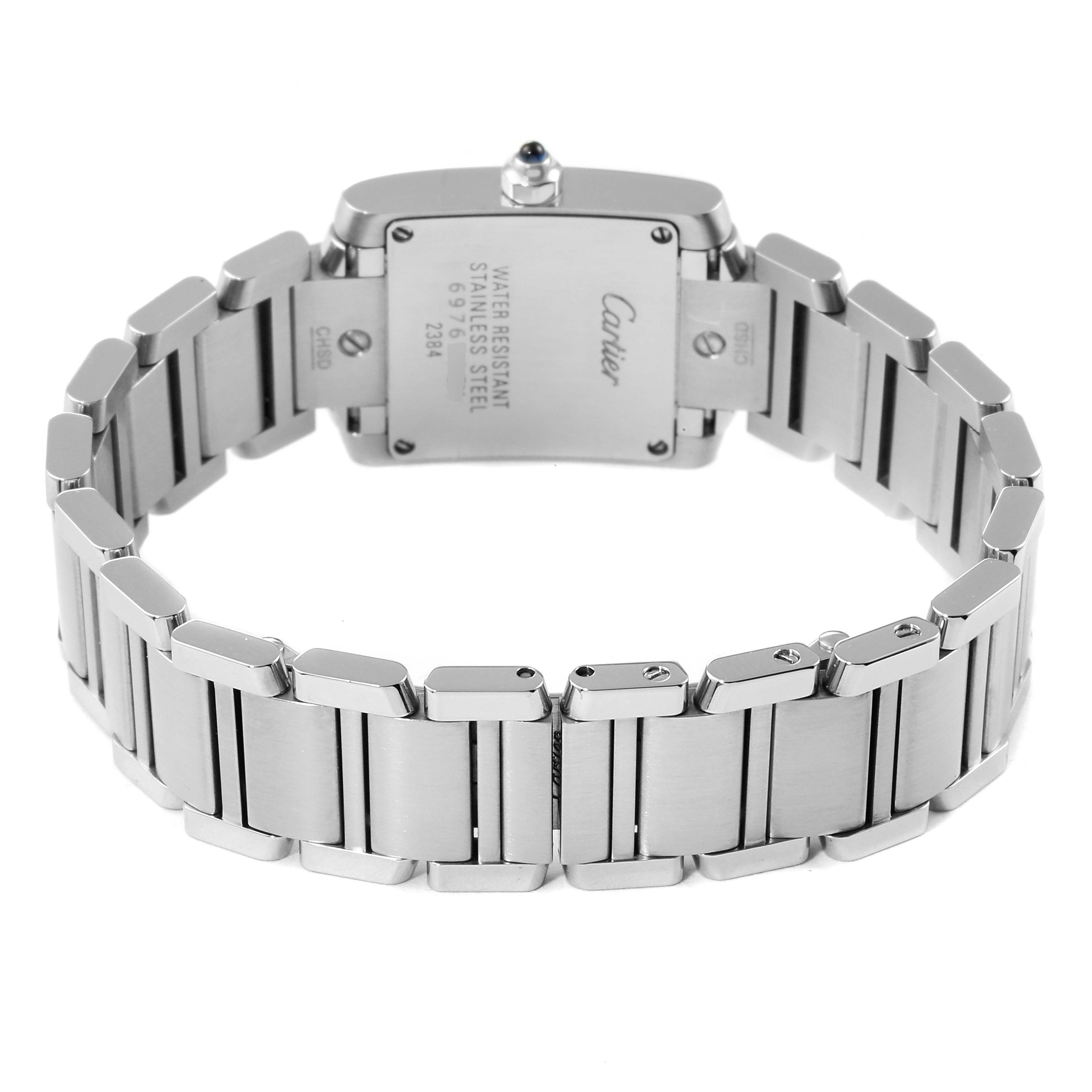 The image shows the back view of the Tank Francaise watch by Cartier, highlighting the stainless steel case and bracelet.