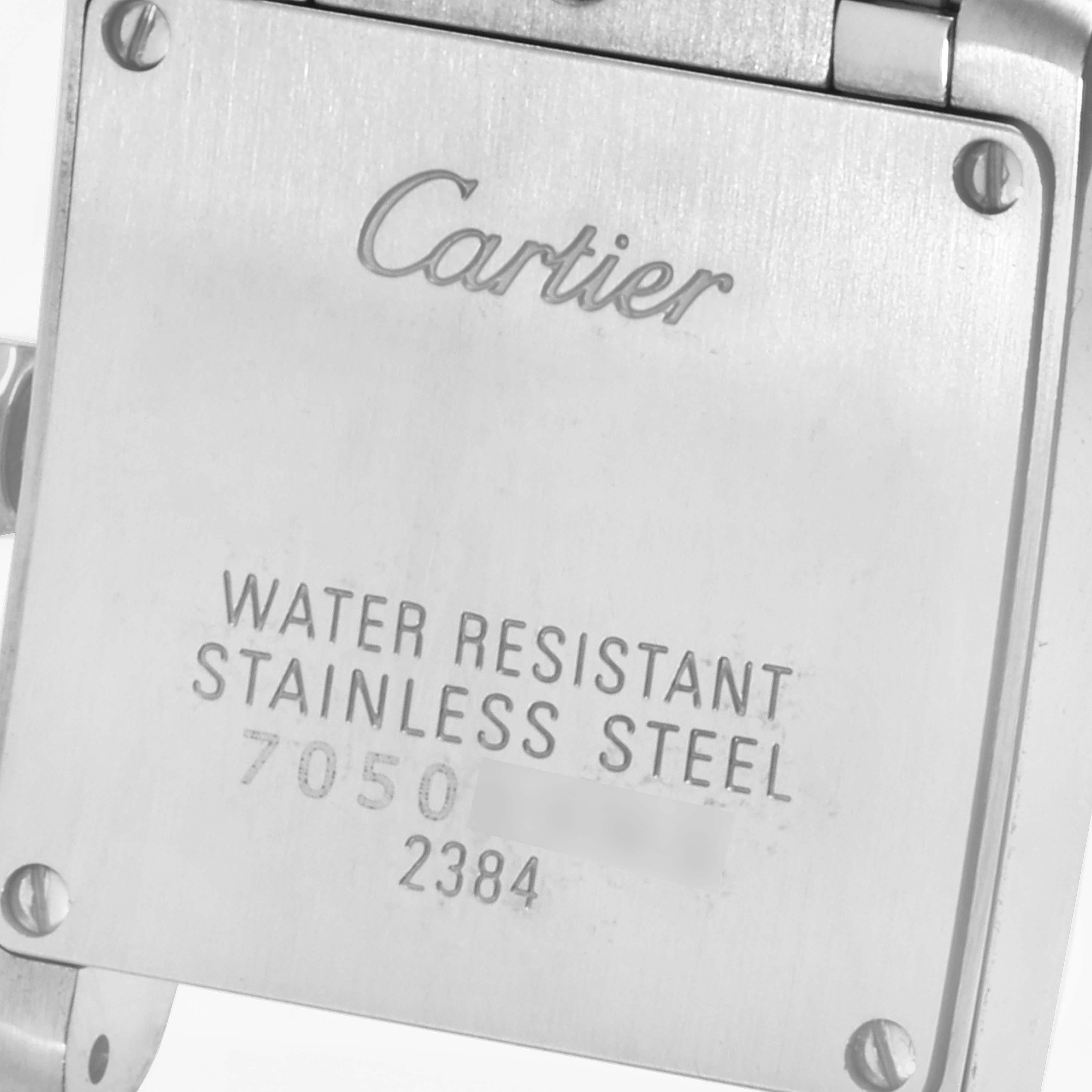 The image shows the back case of a Cartier Tank Francaise W51008Q3 Women's Stainless Steel Silver Dial W51008Q3 Women's Stainless Steel Silver Dial watch, highlighting its water resistance and stainless steel material.