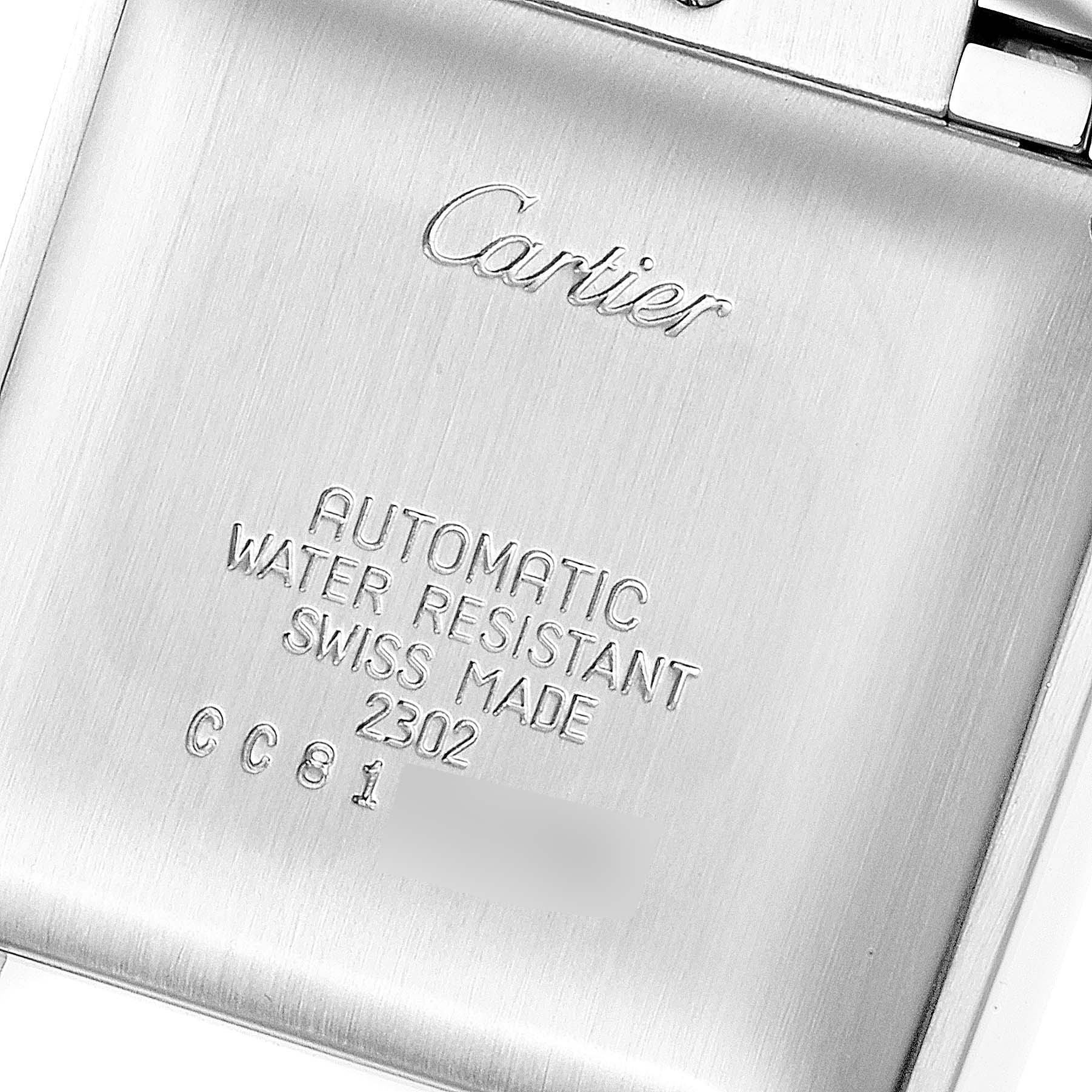 The image shows the back of the Cartier Tank Française watch, displaying its engravings and specifications.